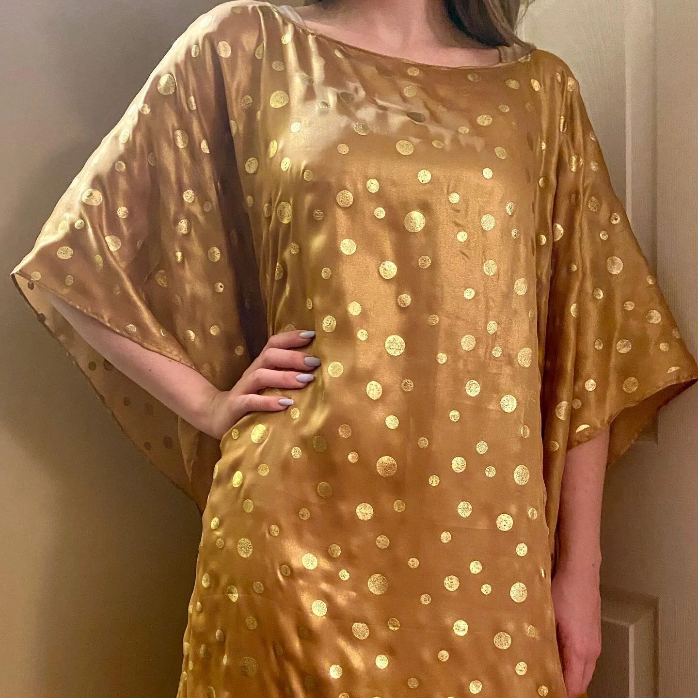 Back to our caftan business. Gold in gold polka dots long caftan.