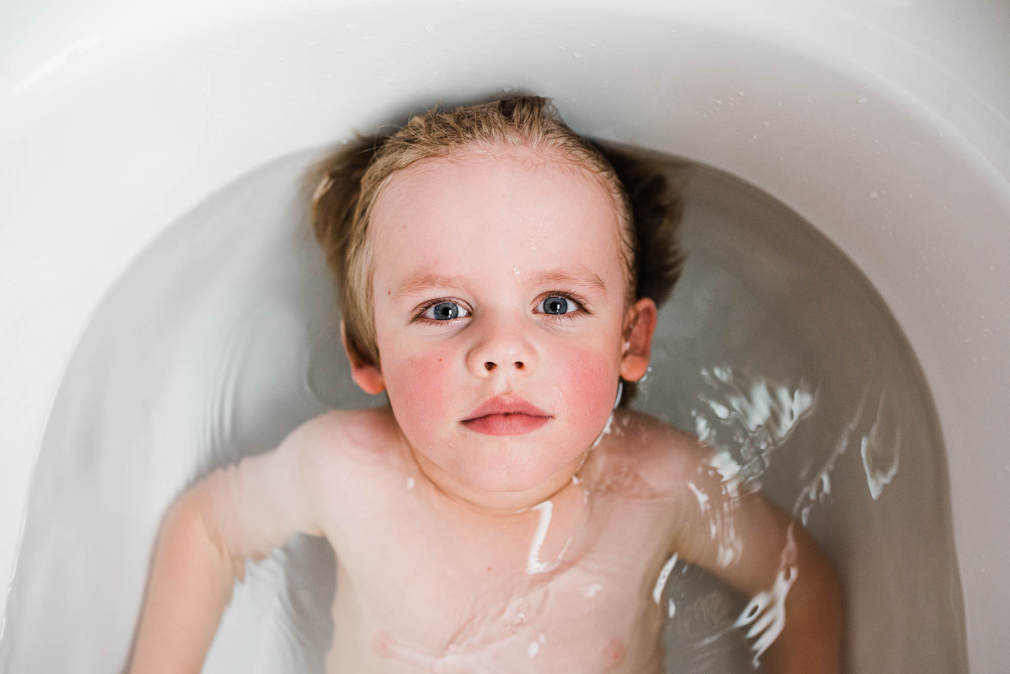 learning_photography_boy_laying_in_a_bath-1.jpg