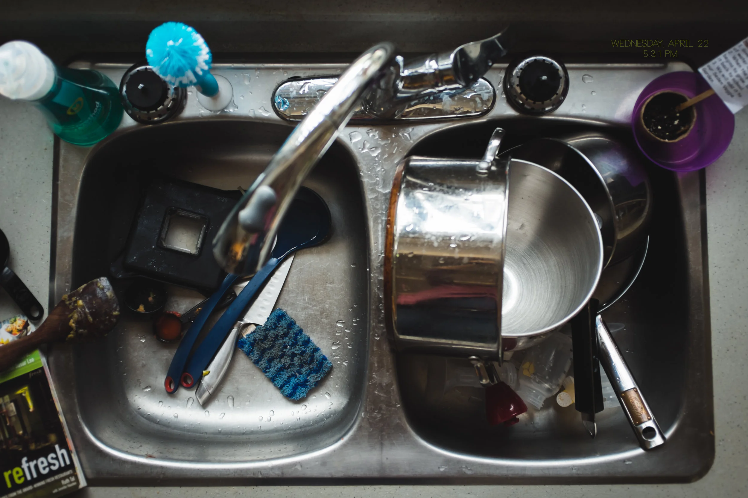 a photograph of dirty dishes sit in a sink-Edit.jpg