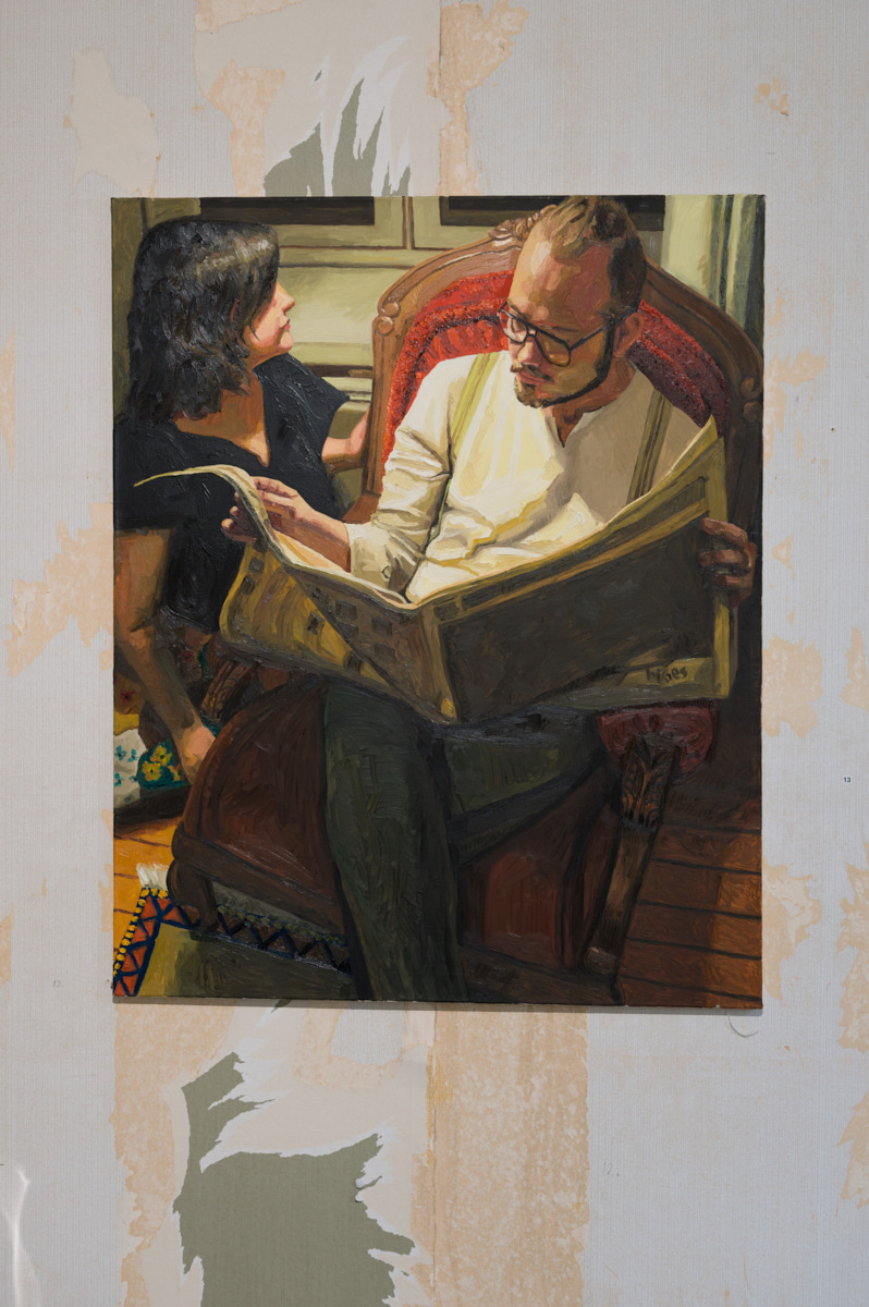 Man reading a newspaper, 2011