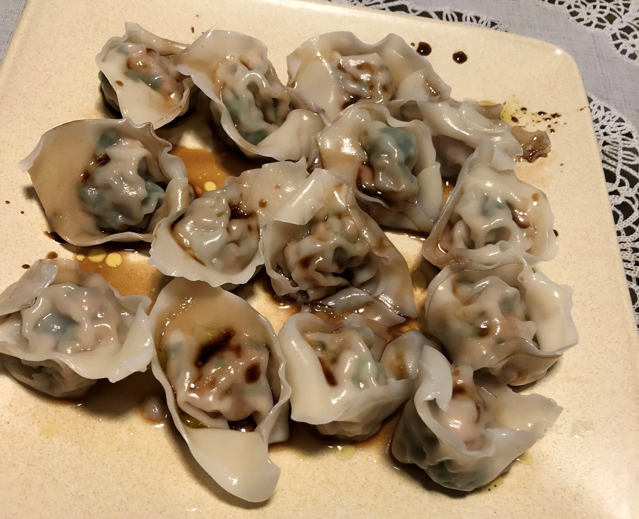  Home made wontons with balsamic vinegar and extra virgin olive oil dressing  