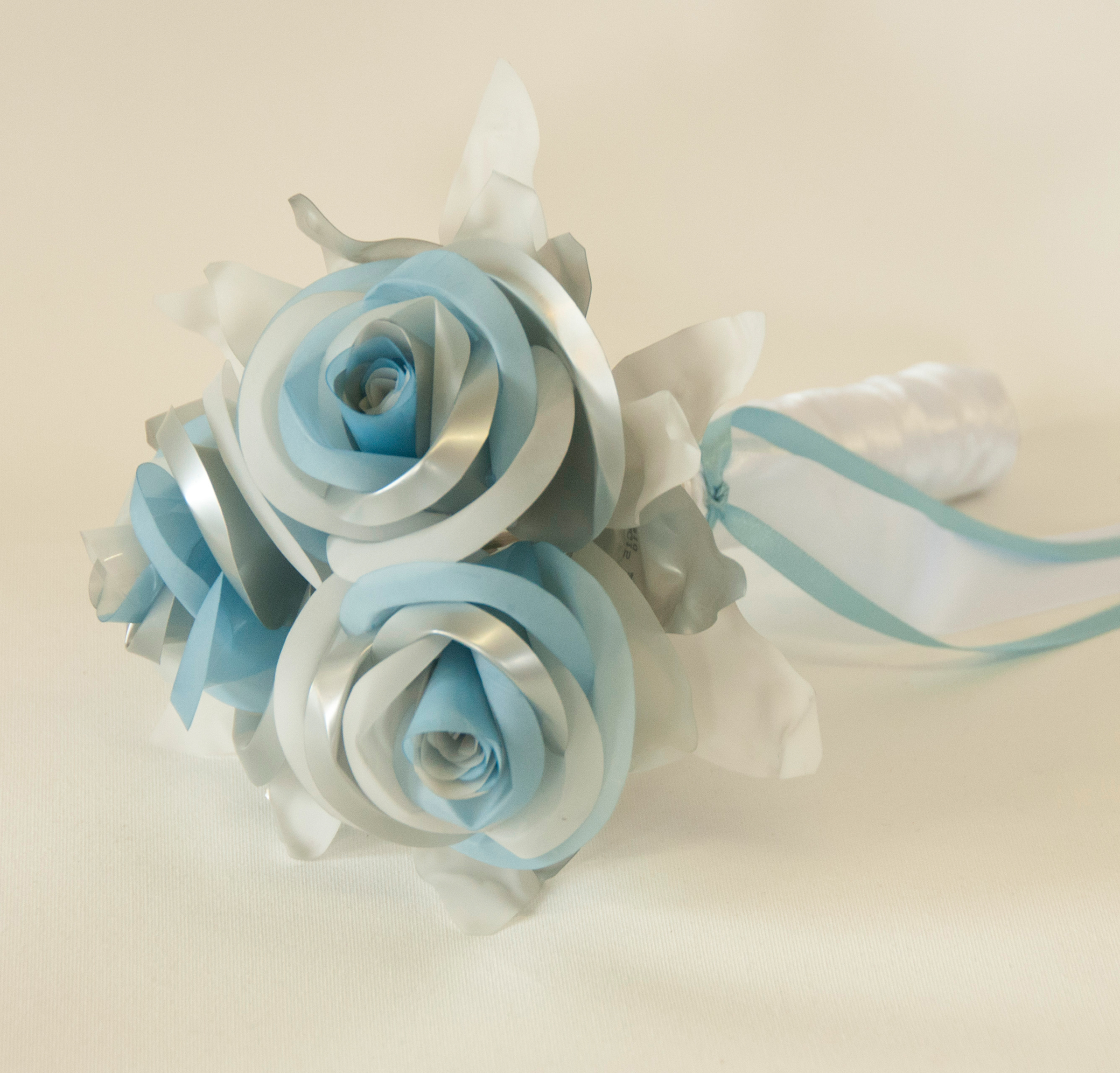 Upcycled blue bottle flower hand made design 