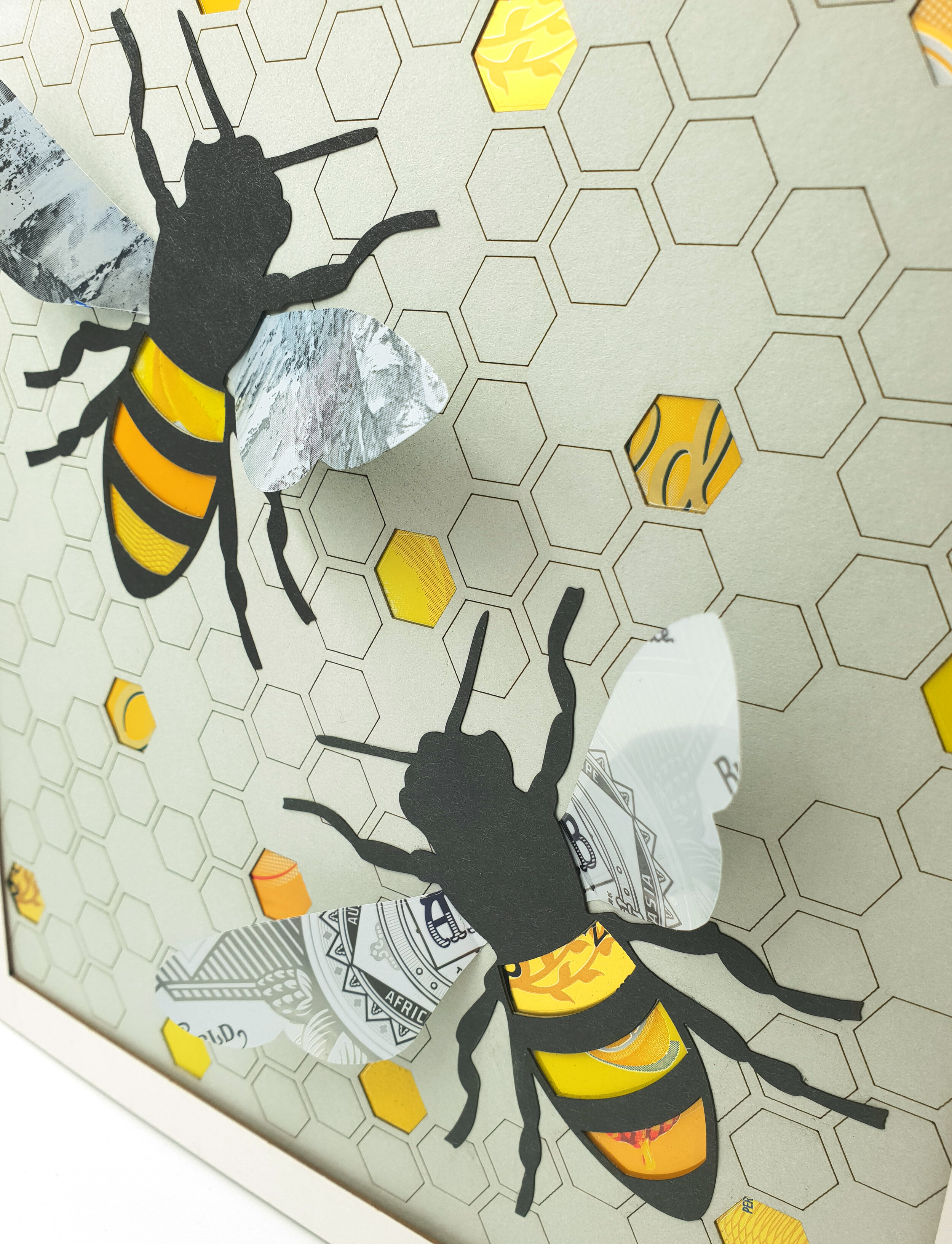 3D Bees black and yellow upcycled can wall art close up