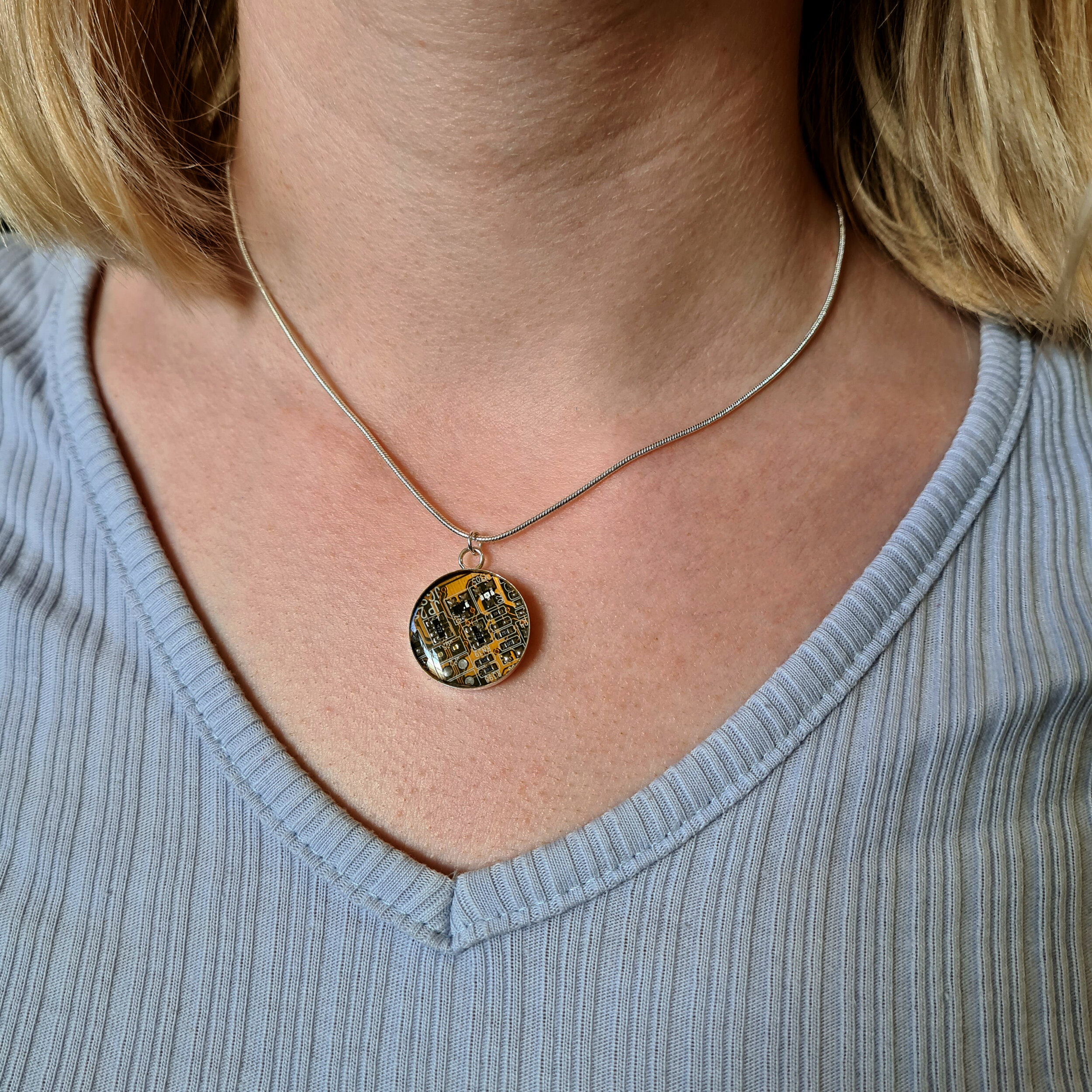 Yellow eco-friendly necklace around neck