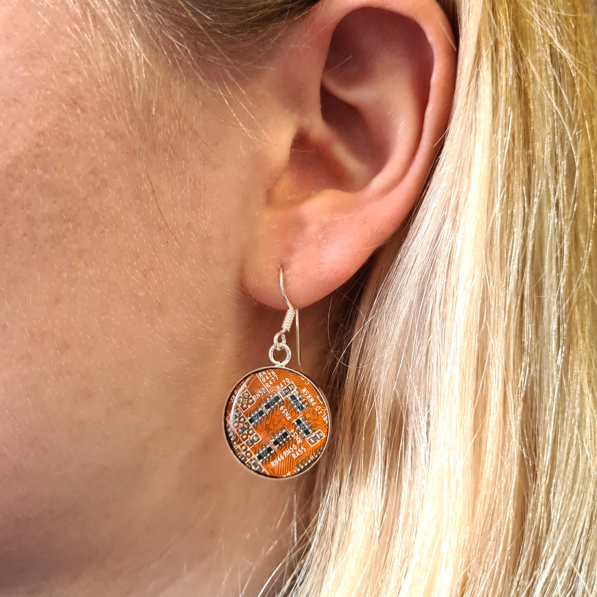 Orange sustainable PCB earrings 