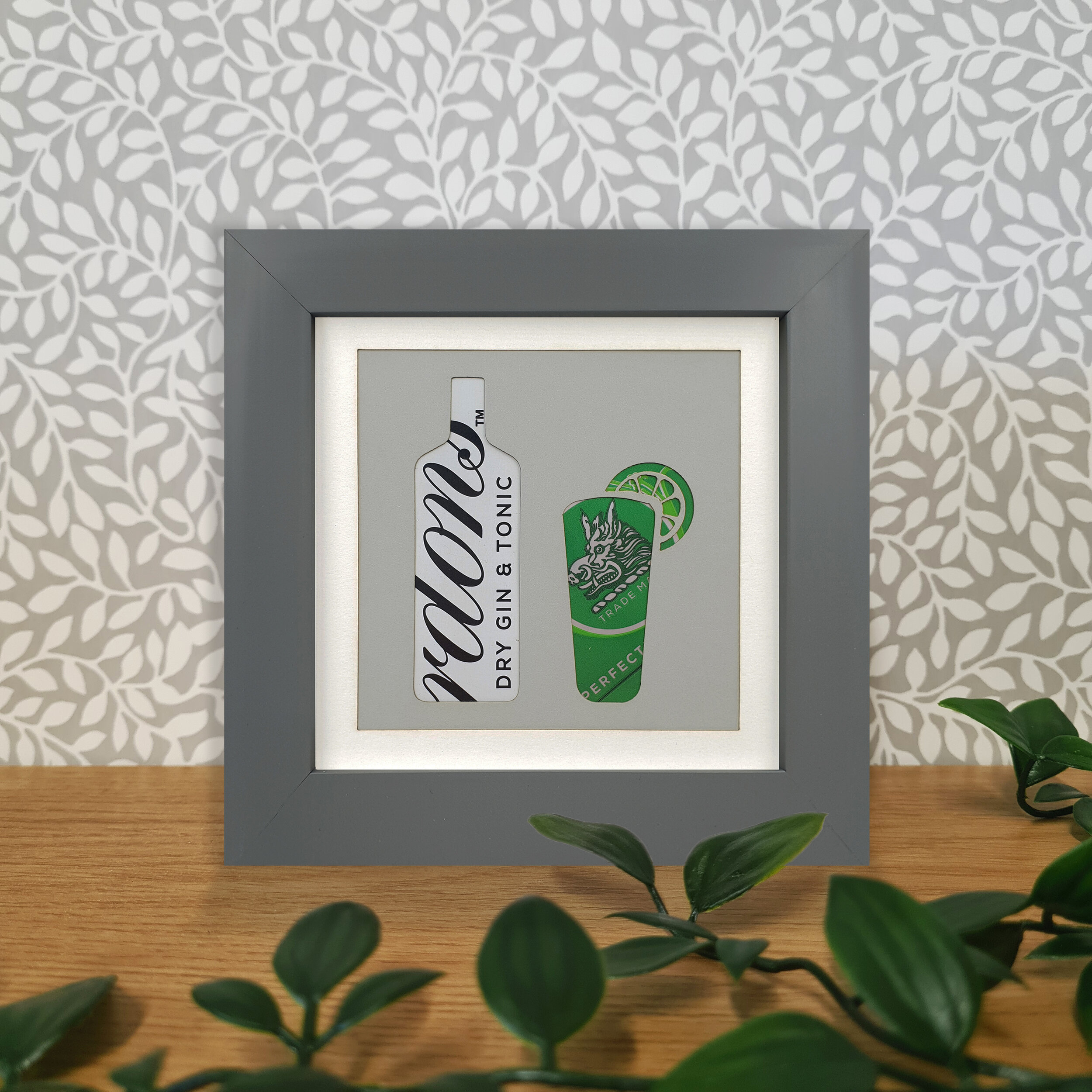 Upcycled green and white can wall decoration 