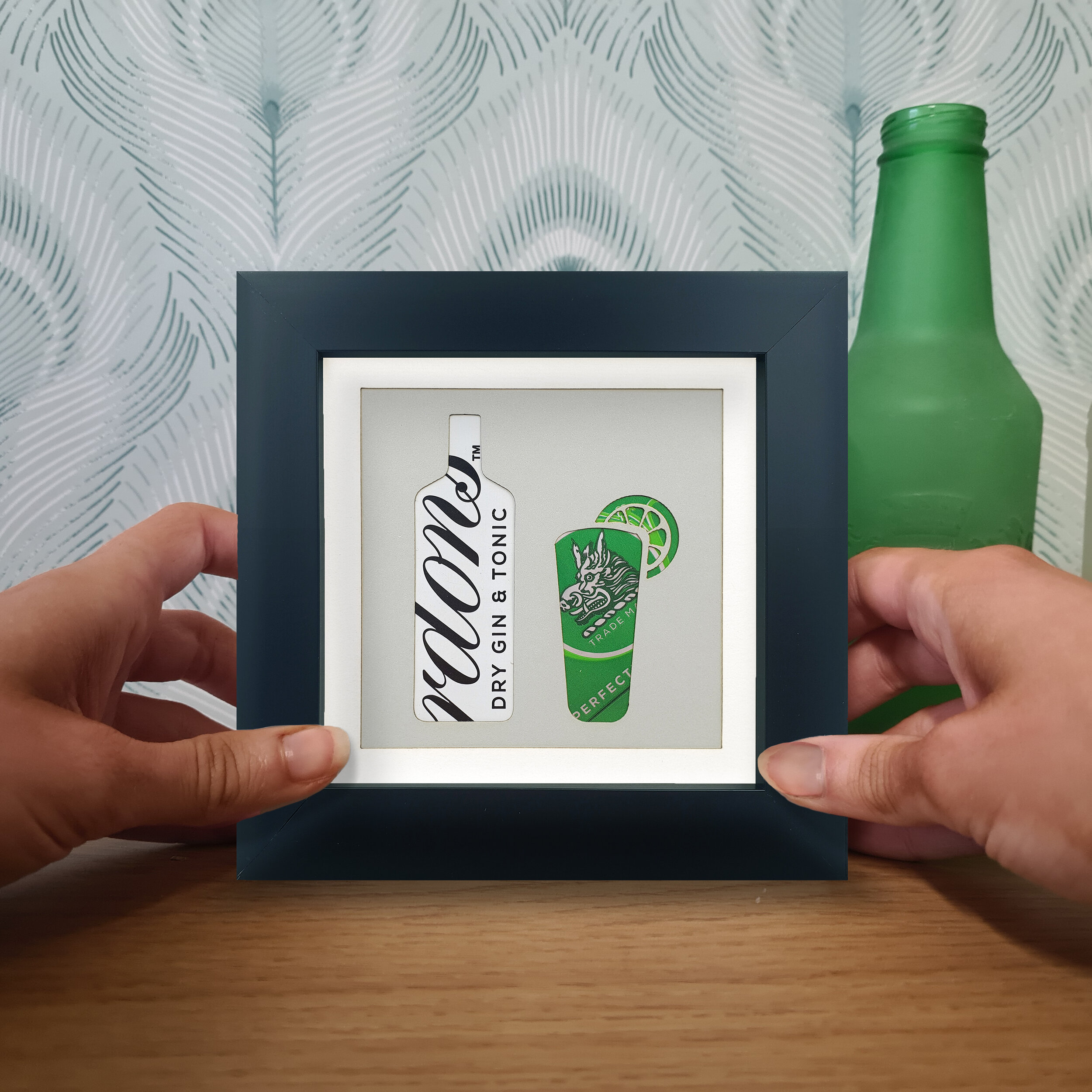 Upcycled green and white beverage design on table 