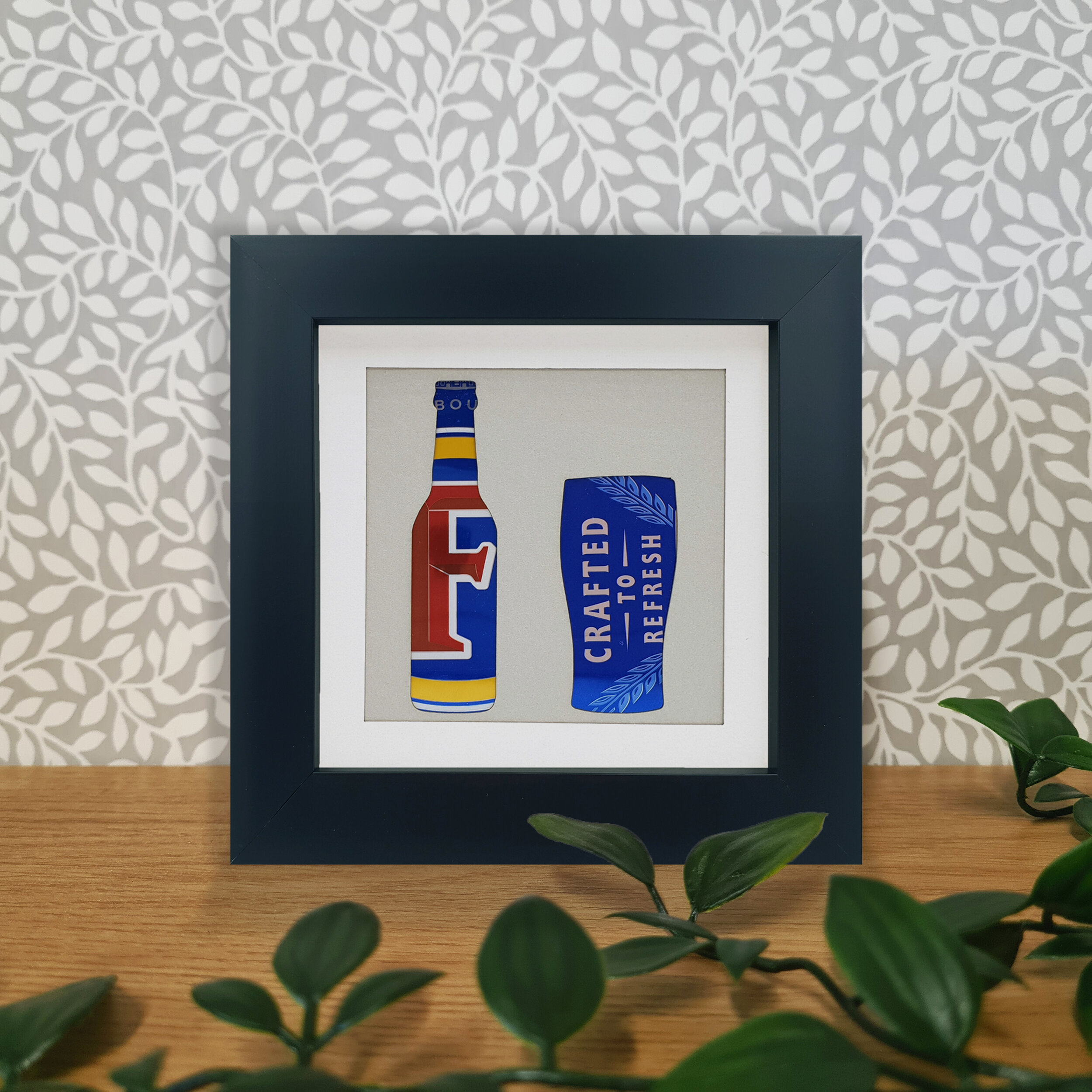 Blue yellow and red bottle upcycled can art 