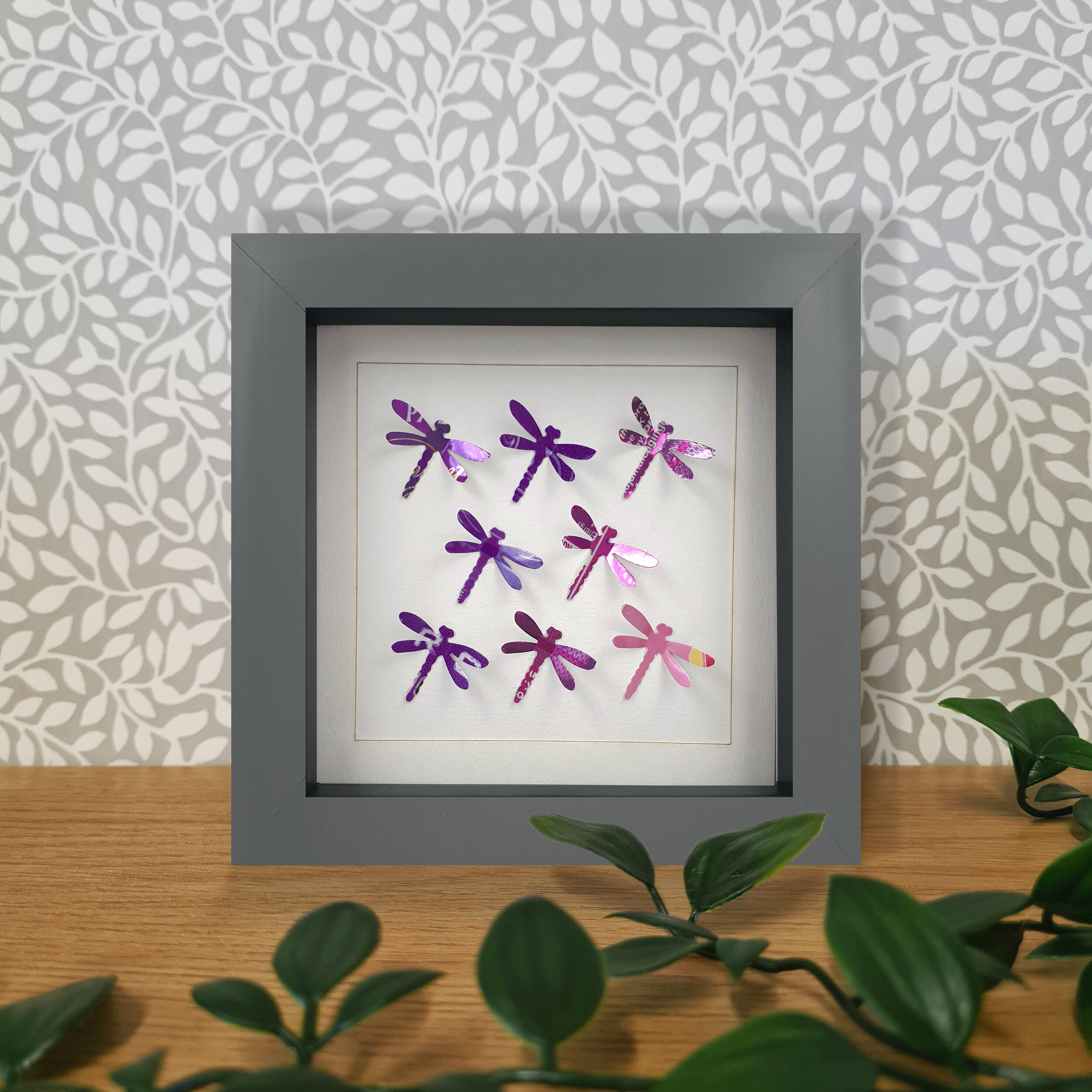 Purple dragonfly repurposed can wall design 