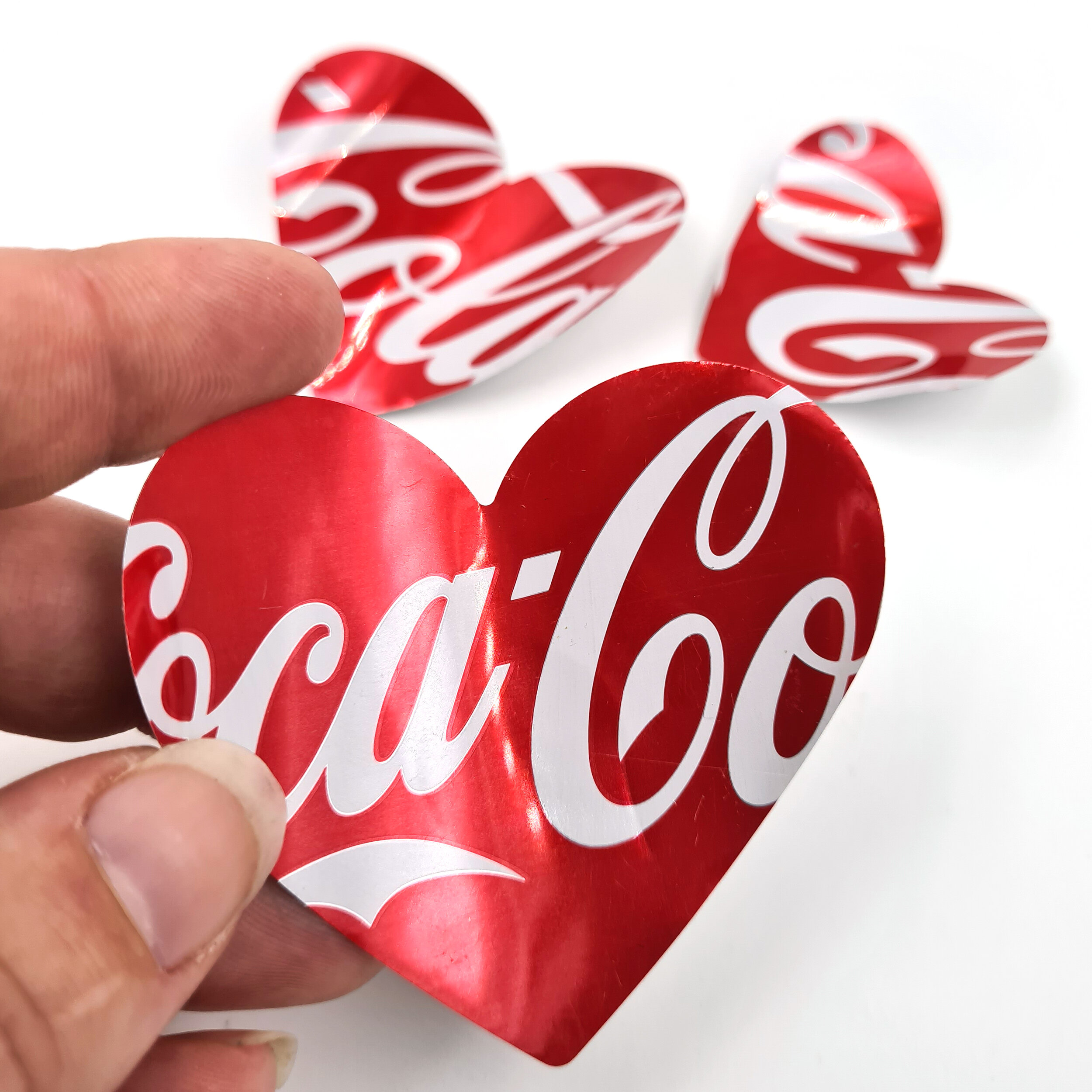 Coca-Cola Heart eco Can Magnets hand made in UK holding
