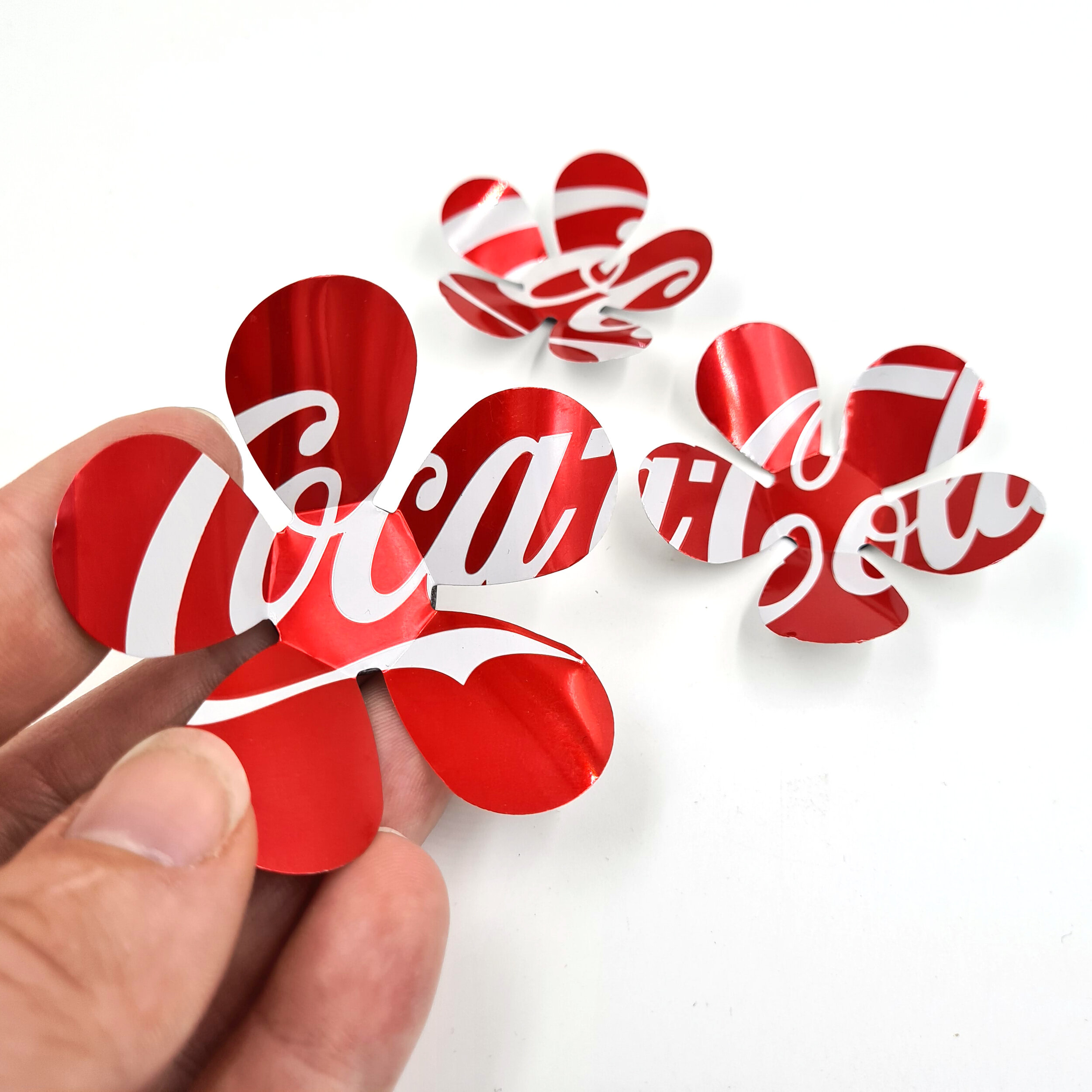 Three Coca-Cola  sustainable hand made Can Flower Magnets holding