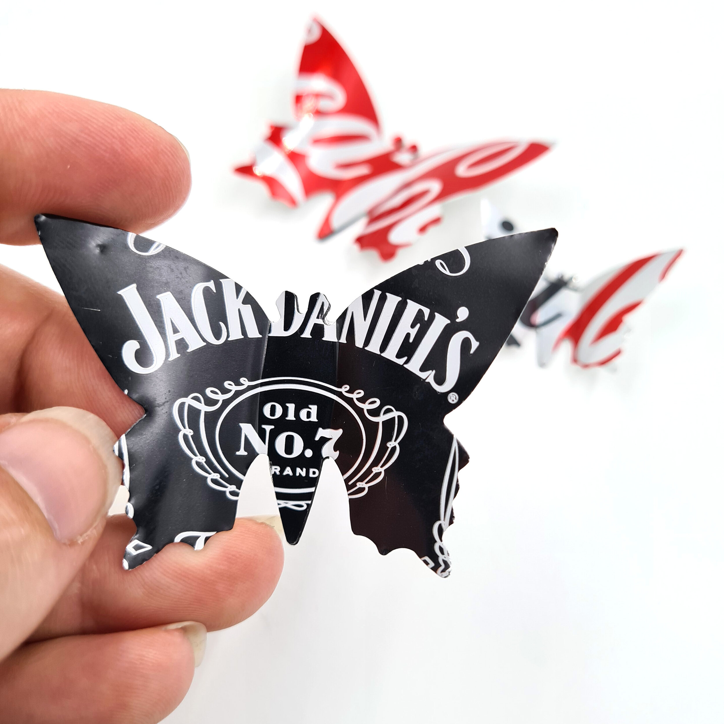 Jack Daniels, Coca-Cola &amp; Diet Coke red black and silver eco Butterfly Can Magnets holding