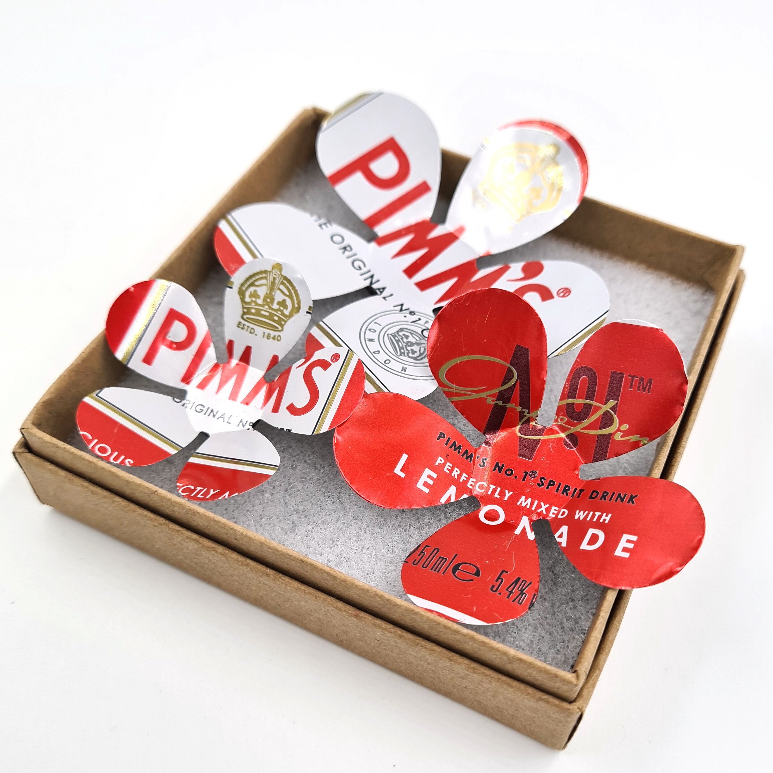 Pimm's red and white sustainable tin Can Flower Magnets in box