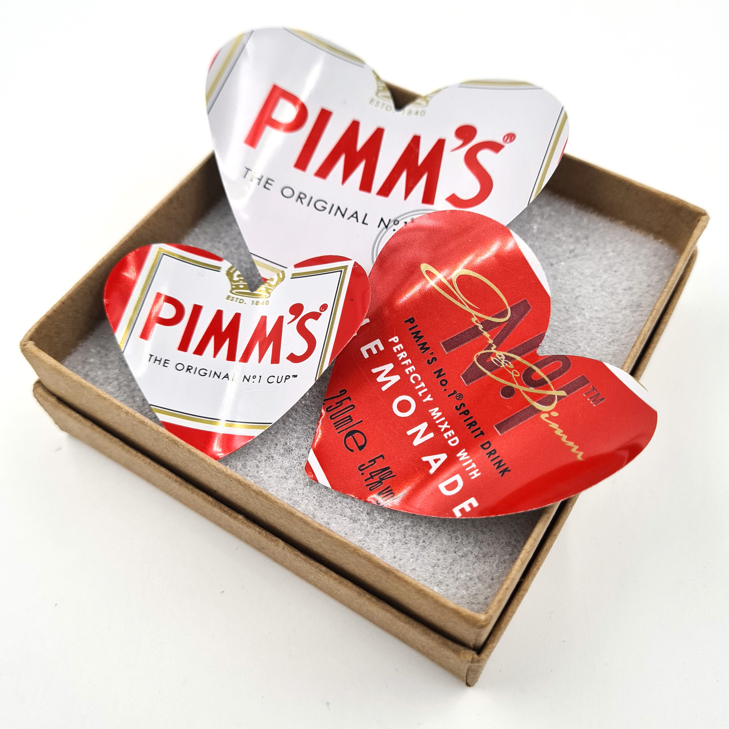 Red and white sustainable Pimm's Heart Can Magnets 