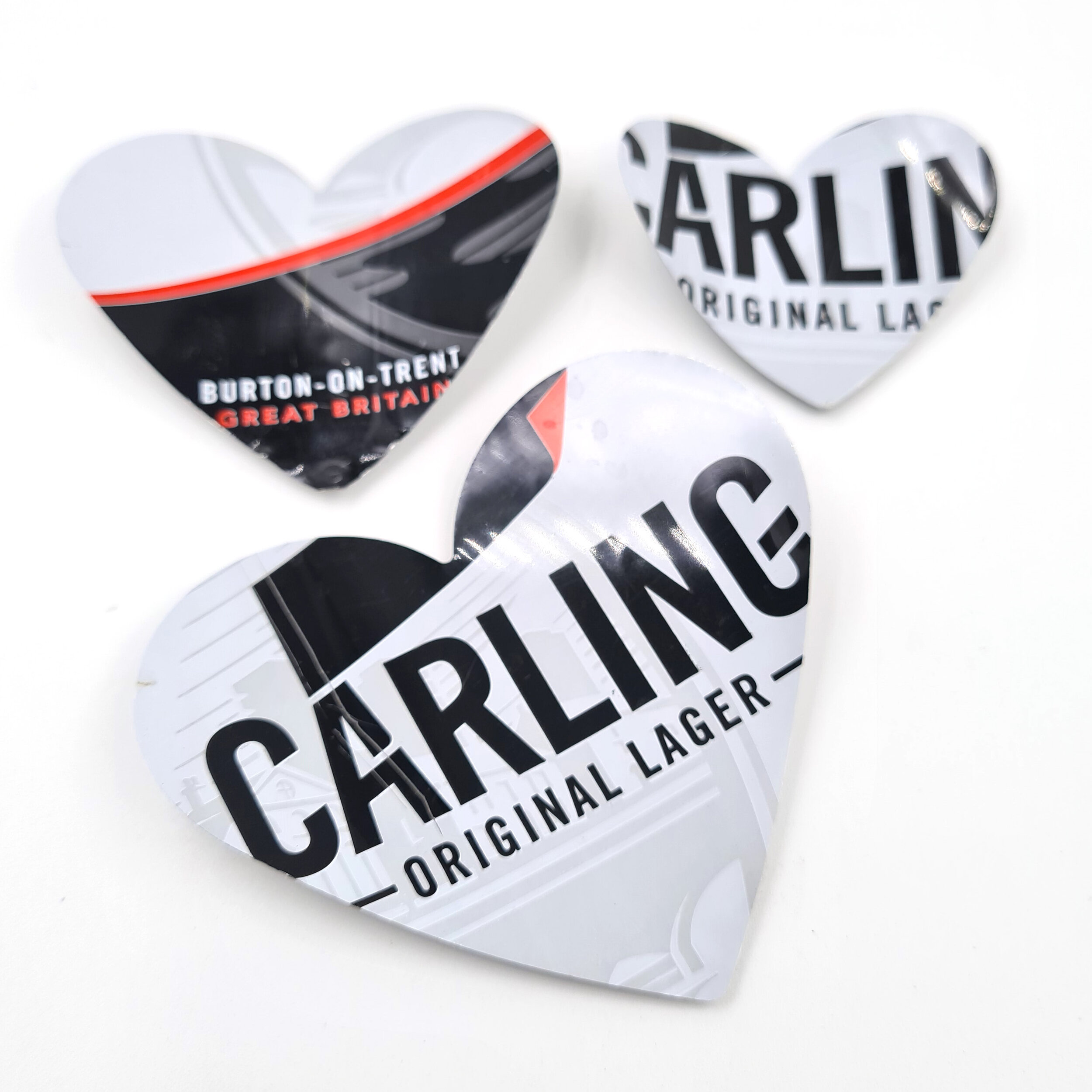 Three Red black and white Carling Heart Can Magnets 