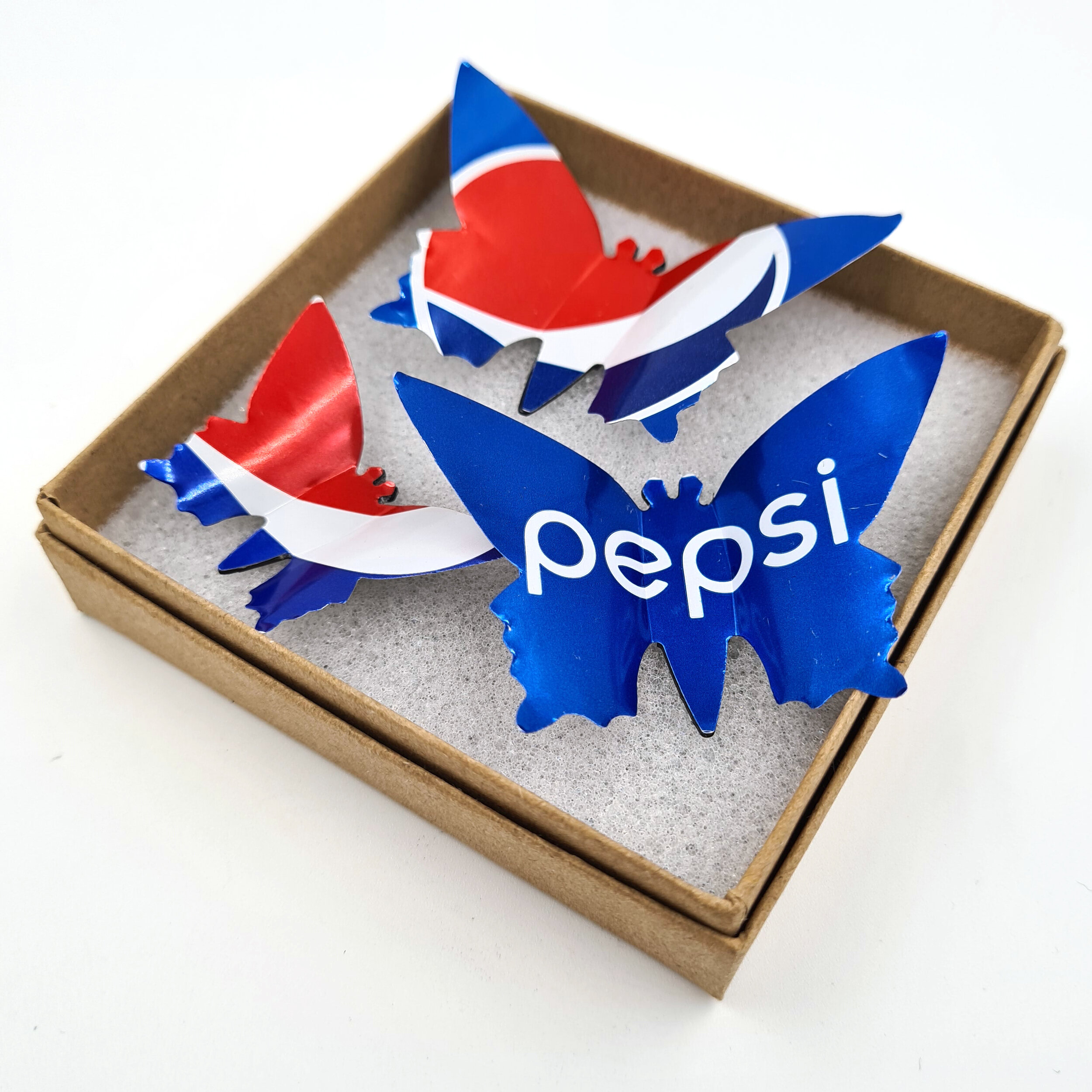 Red blue and white Pepsi Butterfly Can Magnets in box