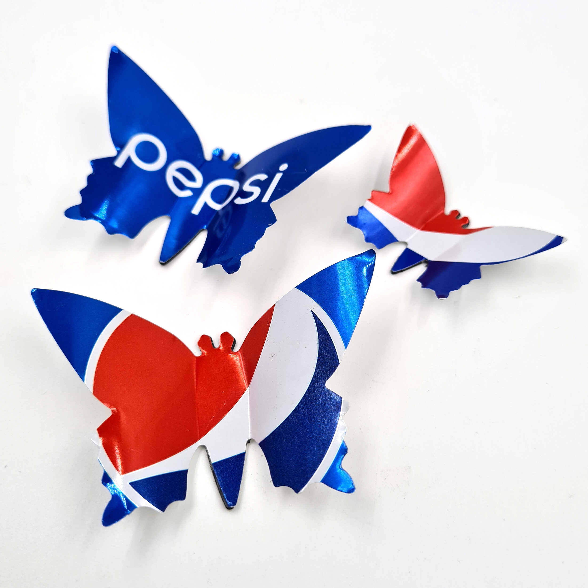 Three Red blue and white Pepsi Butterfly Can Magnets