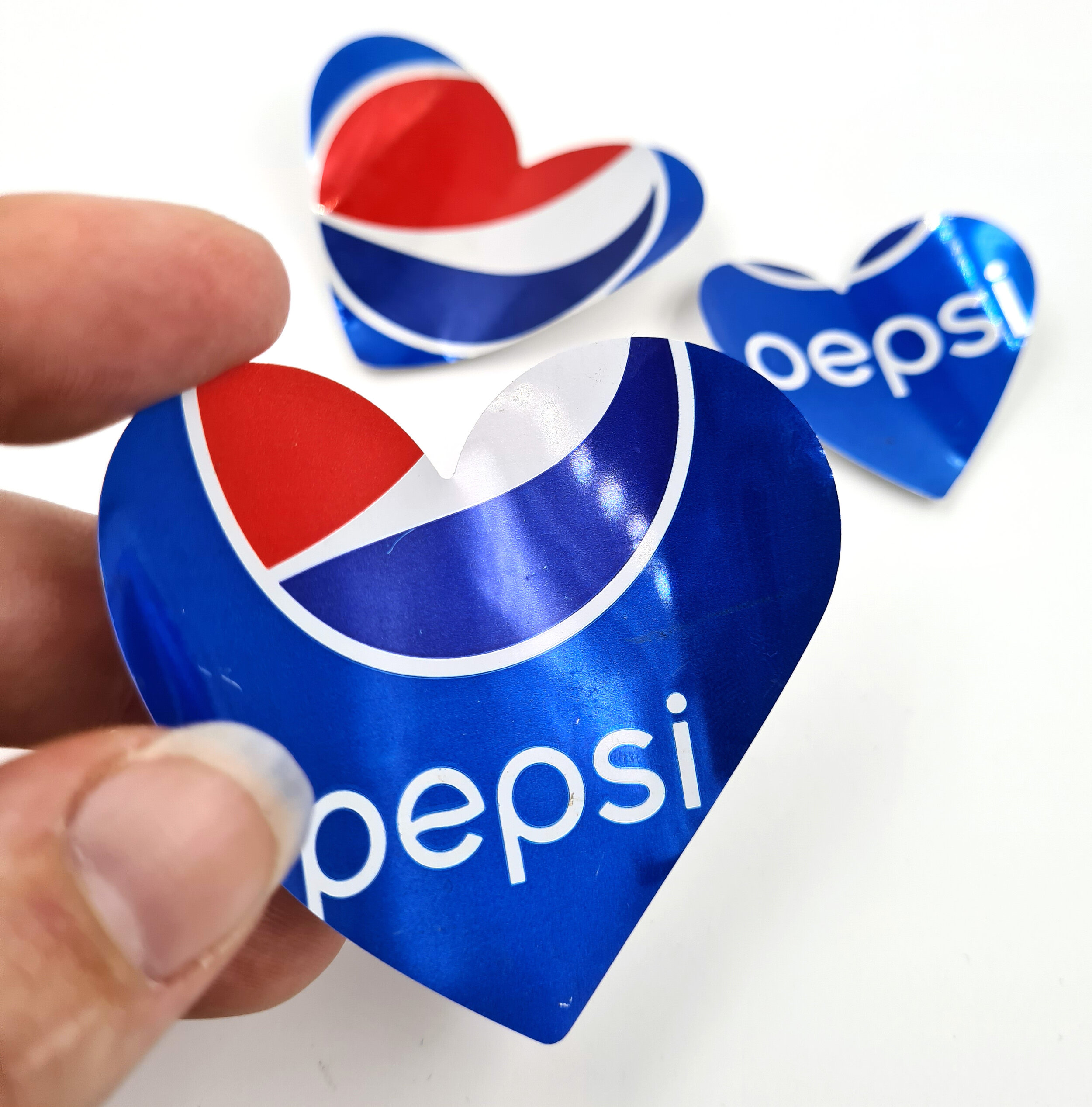 Pepsi red blue and white Heart Can Magnets holding