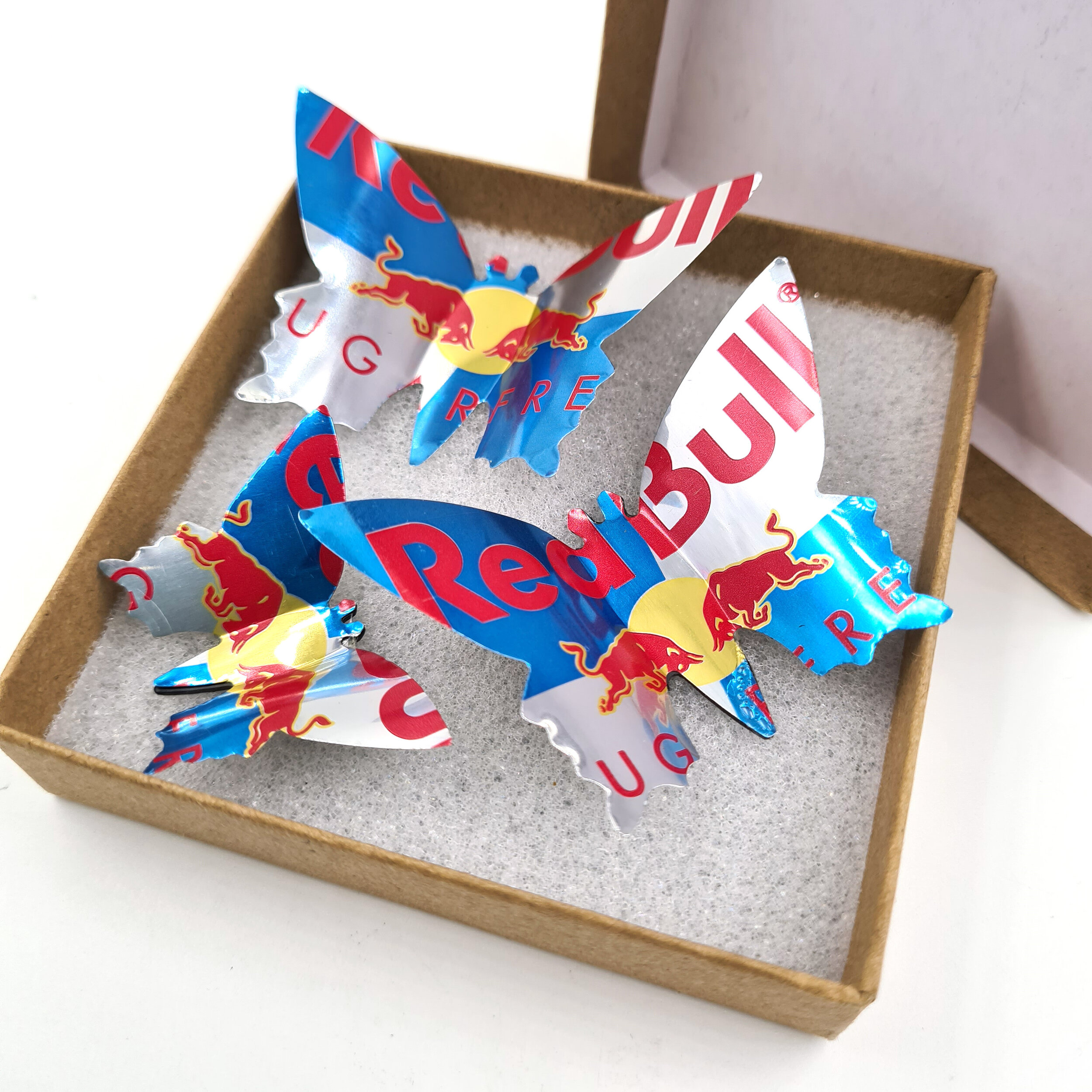 Red Creative sustainable Red Bull Sugar Free Butterfly Can Magnets in box