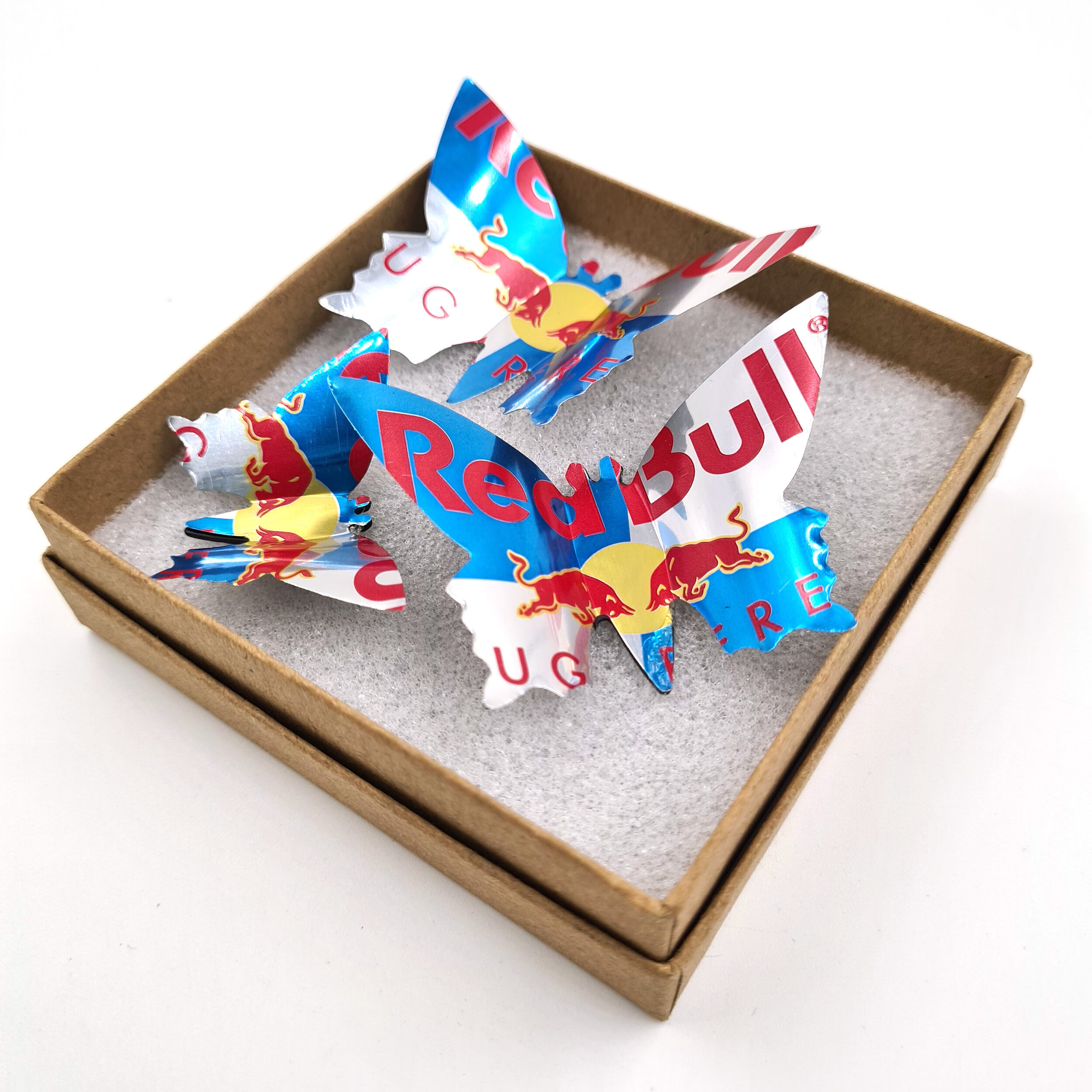 Red Creative sustainable Red Bull Sugar Free Butterfly Can Magnets in box