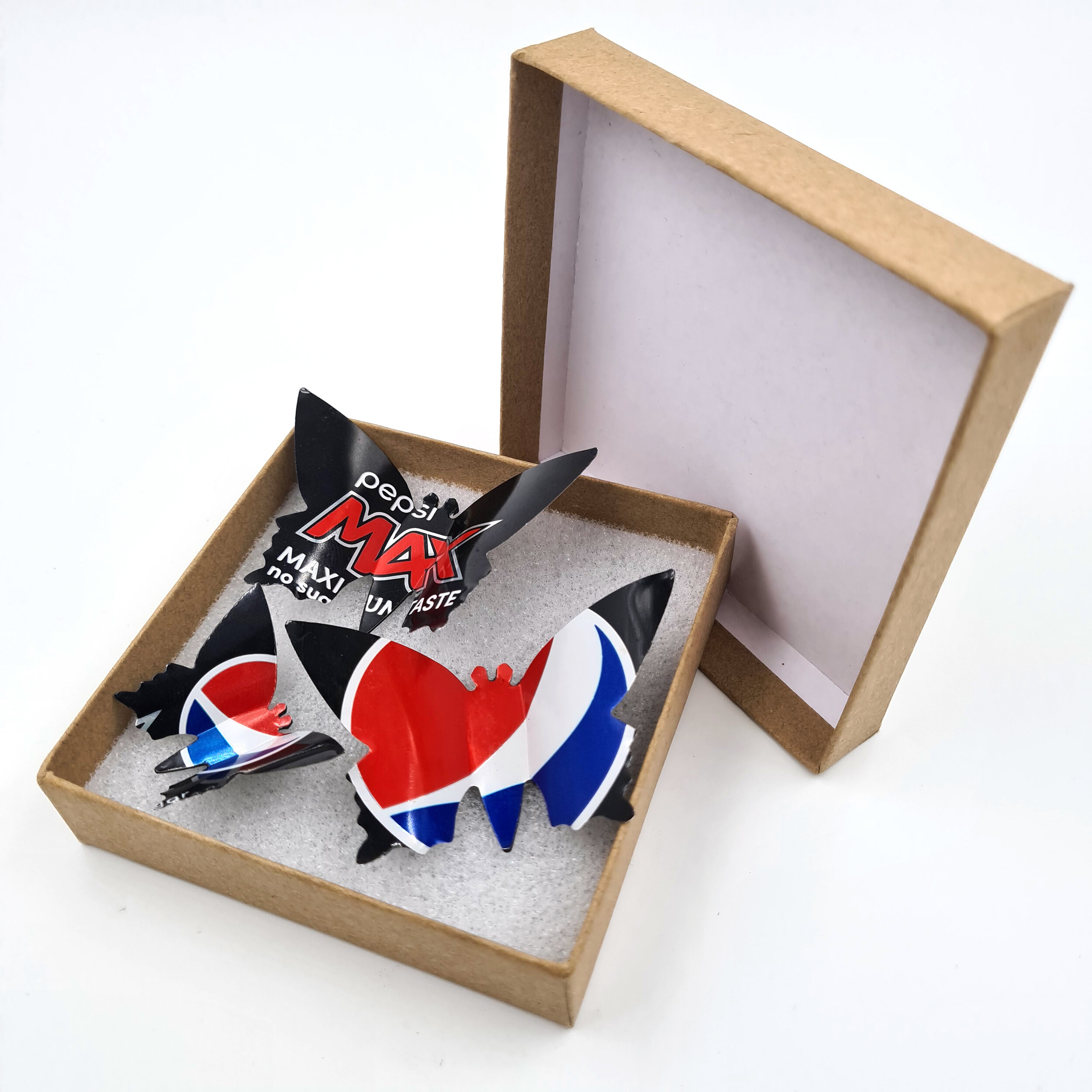 Black blue and red eco Pepsi Max Butterfly Can Magnets in sustainable box