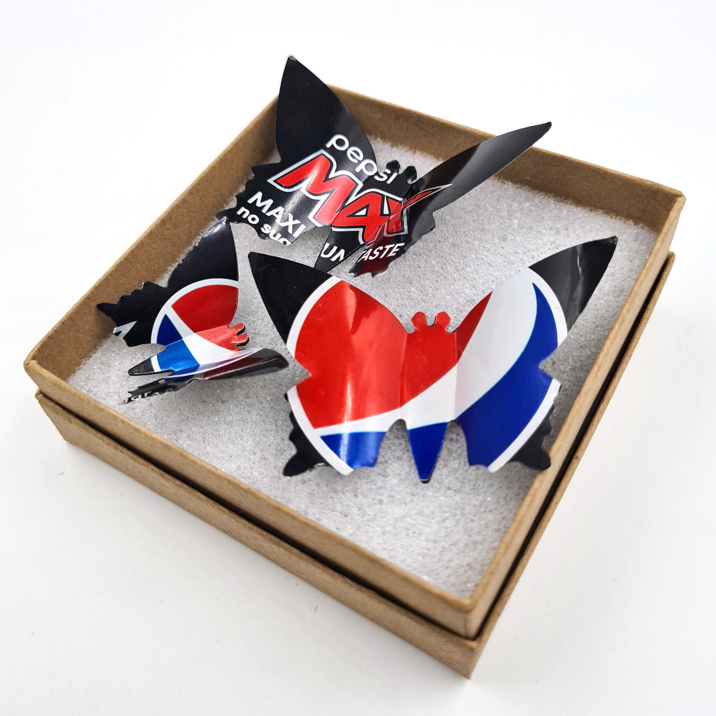 Black blue and red eco Pepsi Max Butterfly Can Magnets in sustainable box 