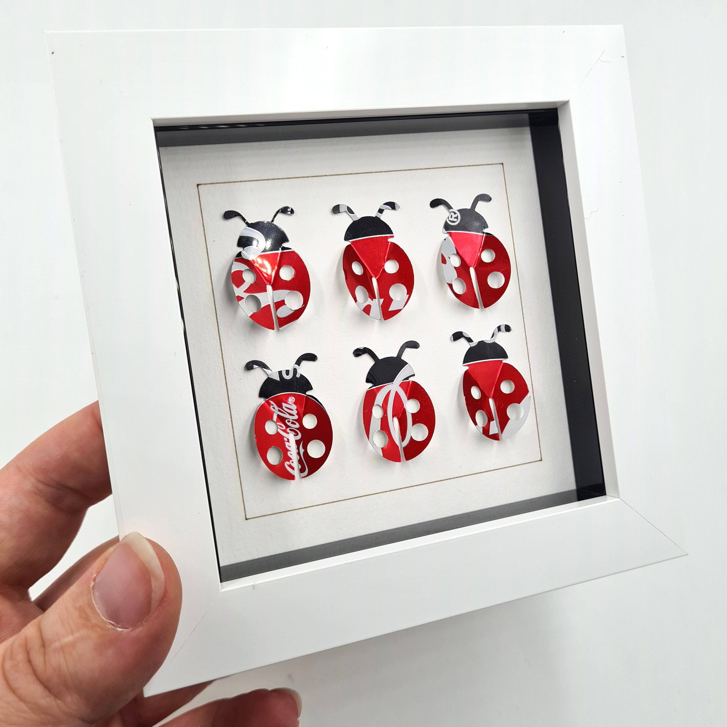 Ladybird upcycled can art white frame close up 1.jpg