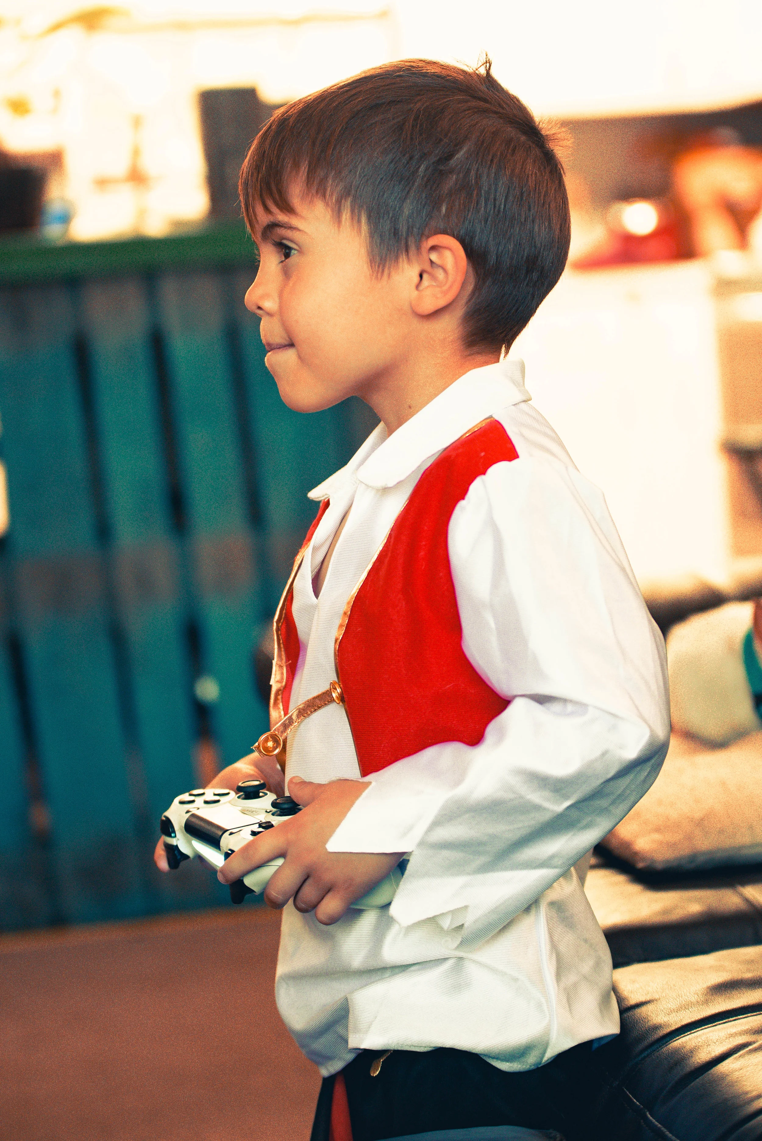 My son playing Fortnite in my Chickamauga, GA living room. (Yes, my husband made the pallet island in the background!)