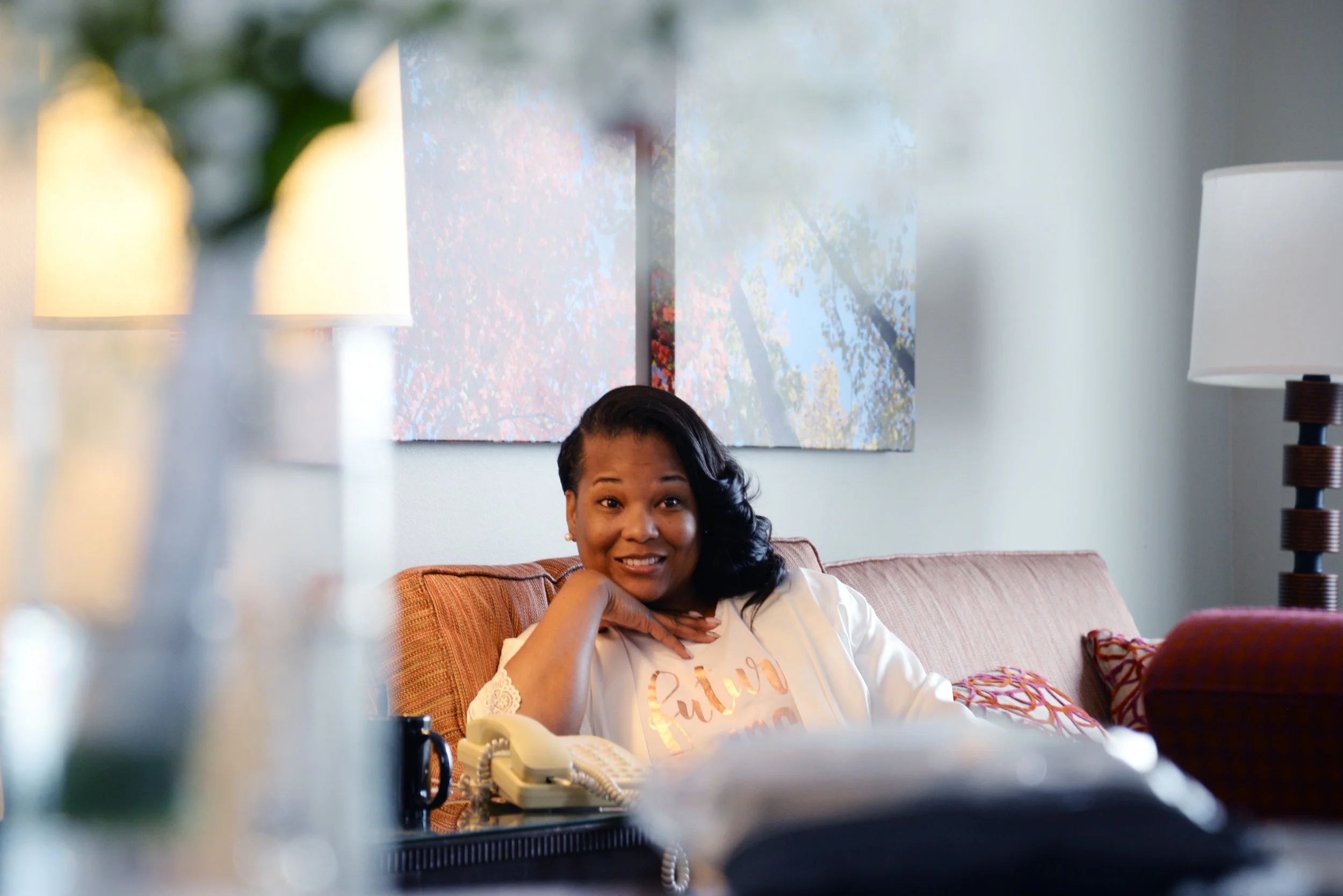 Getting ready photo taken at The Chattanoogan Hotel, downtown Chattanooga before her wedding at the Hunter Museum of American Art. There was a huge window to her left which lit the room almost perfectly. Anyone could have taken this photo.