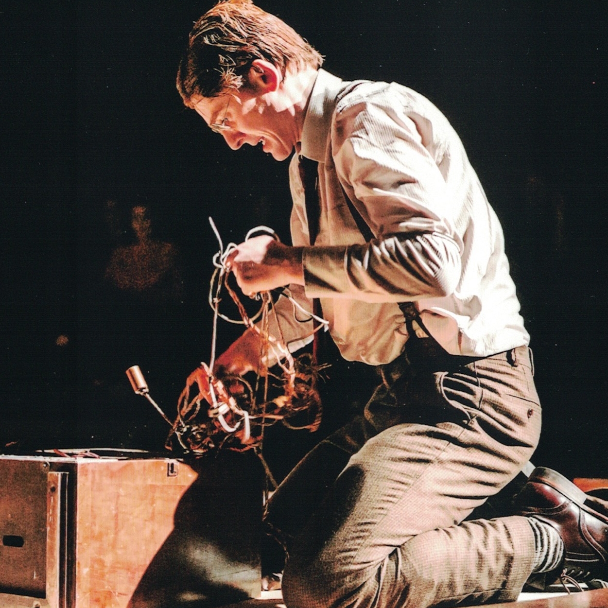 Brendan Bracken (Ian Toner) in a frenzied attack on the wireless set in Double Cross.