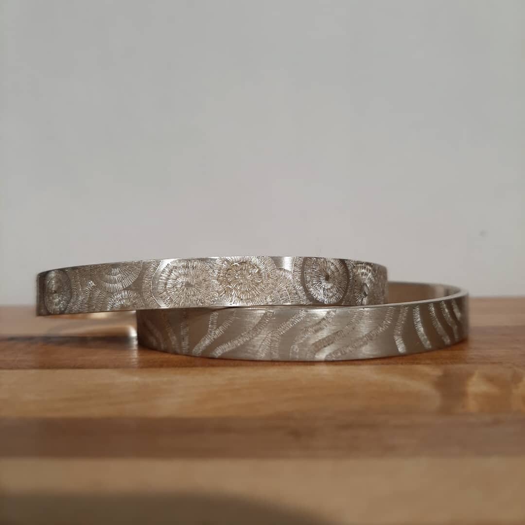 Cuffs with a matte finish and texture on the outside and a high shine on the inside. 

::Argentium Silver::