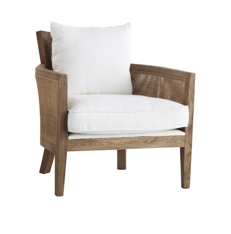 Price: $720.97 Pros: Seat and back cushions make this chair uber comfy, while the upright shape keeps it functional for working at a desk. Cons: Of all the chair options on our list, this one skews the most traditional, and might not be laid-back enough for our organic modern living room. It’s also the priciest on the list.