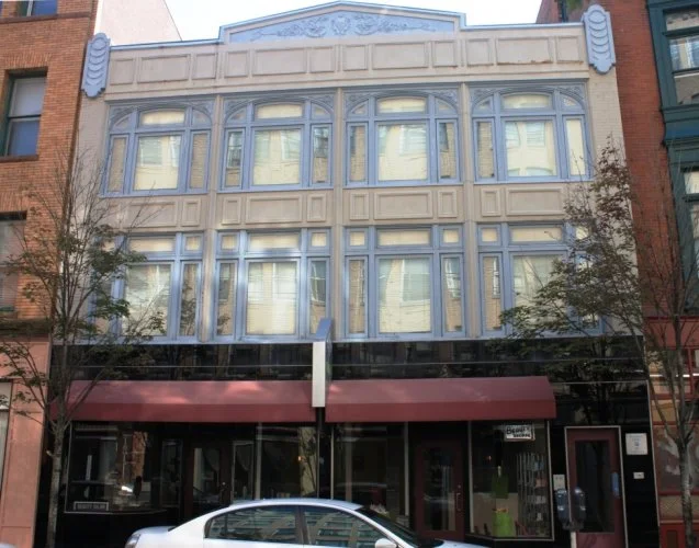 Franklin Building, 53-57 Orange Street, c. 1870; 1927 facade by Brown & Von Baron.
