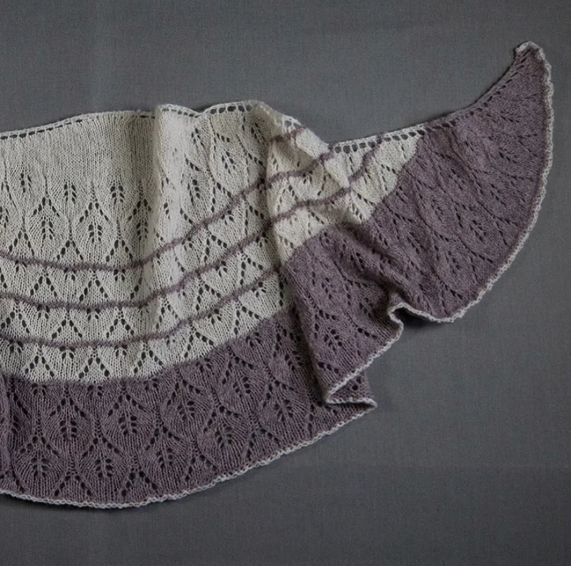 A Potent Remedy- Designed by Alex Richards using our Seafolk 1 ply fingering weight in the colour Amethyst + Our Wild Wool 1 ply fingering weight in Natural White. https://www.ravelry.com/patterns/library/a-potent-remedy