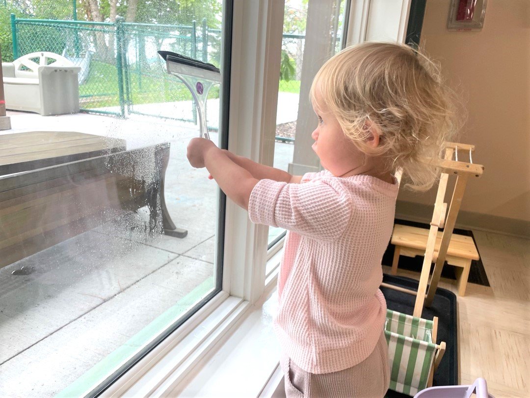 Toddler washing windows (1).jpg