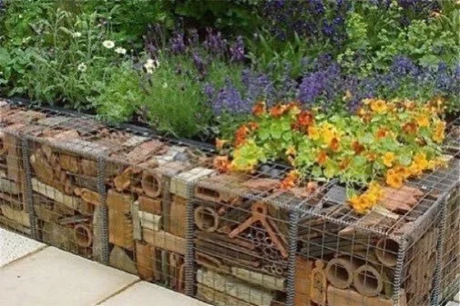 A great habitat for bugs, amphibians and pollinators like bees, hoverflies, moths and butterflies! This gabion wall creates a huge bug hotel and you can also plant it with wildflowers for extra brownie points with your local wildlife