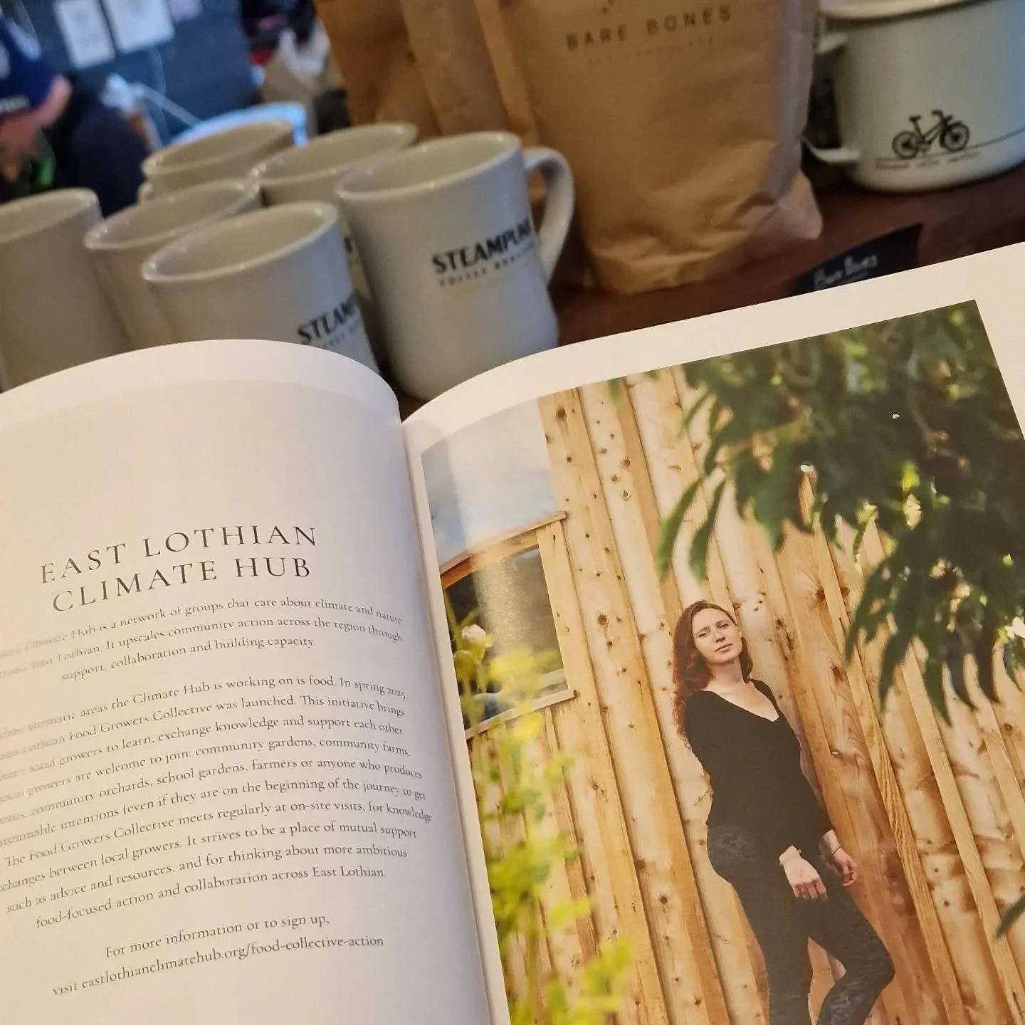 A happy collision of wonderful things - @landseahills new book, featuring oor Tessie from the @el_climate_hub whilst in one of my fave coffee shops @steampunkcoffee - serving coffee in @2gocup_org reusable cups 💖 Some days are just great aren't they
