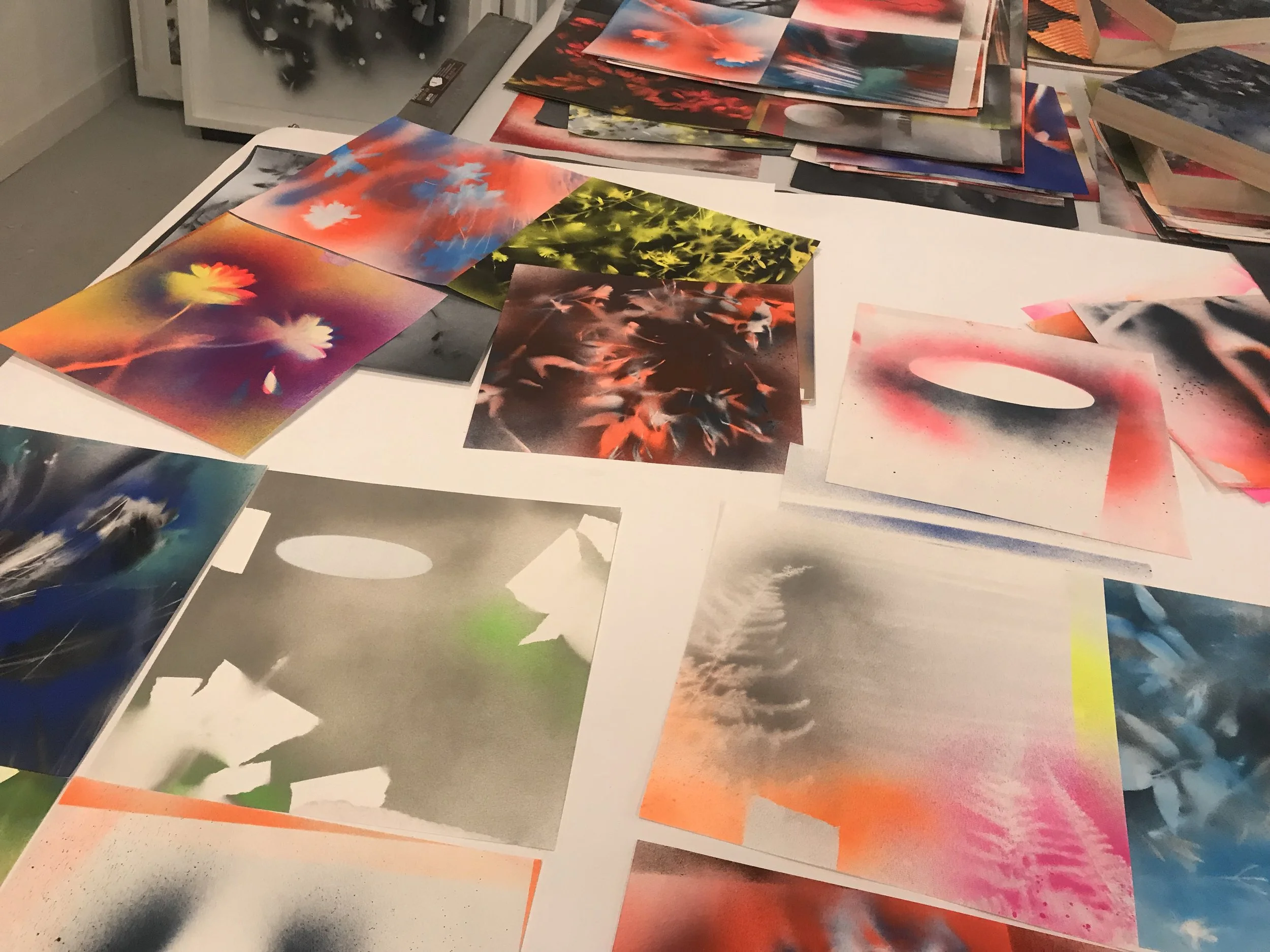 Studio shot of working on the collaged together paintings