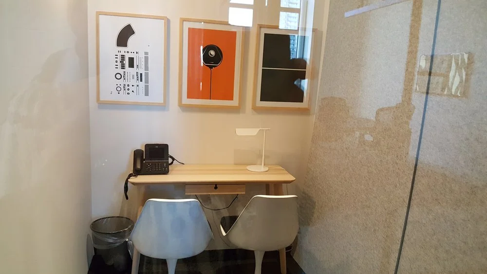 Smaller breakout rooms are across from the larger conference rooms and serve as private phone or meeting rooms.