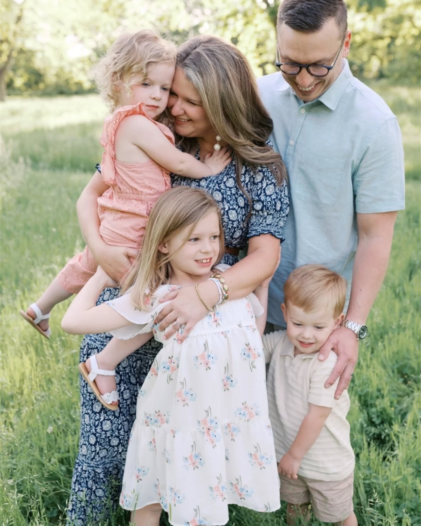 In my family photo sessions, we play, we laugh, and we have fun! I'll always get beautiful photos of your family, no matter how active we need to be!