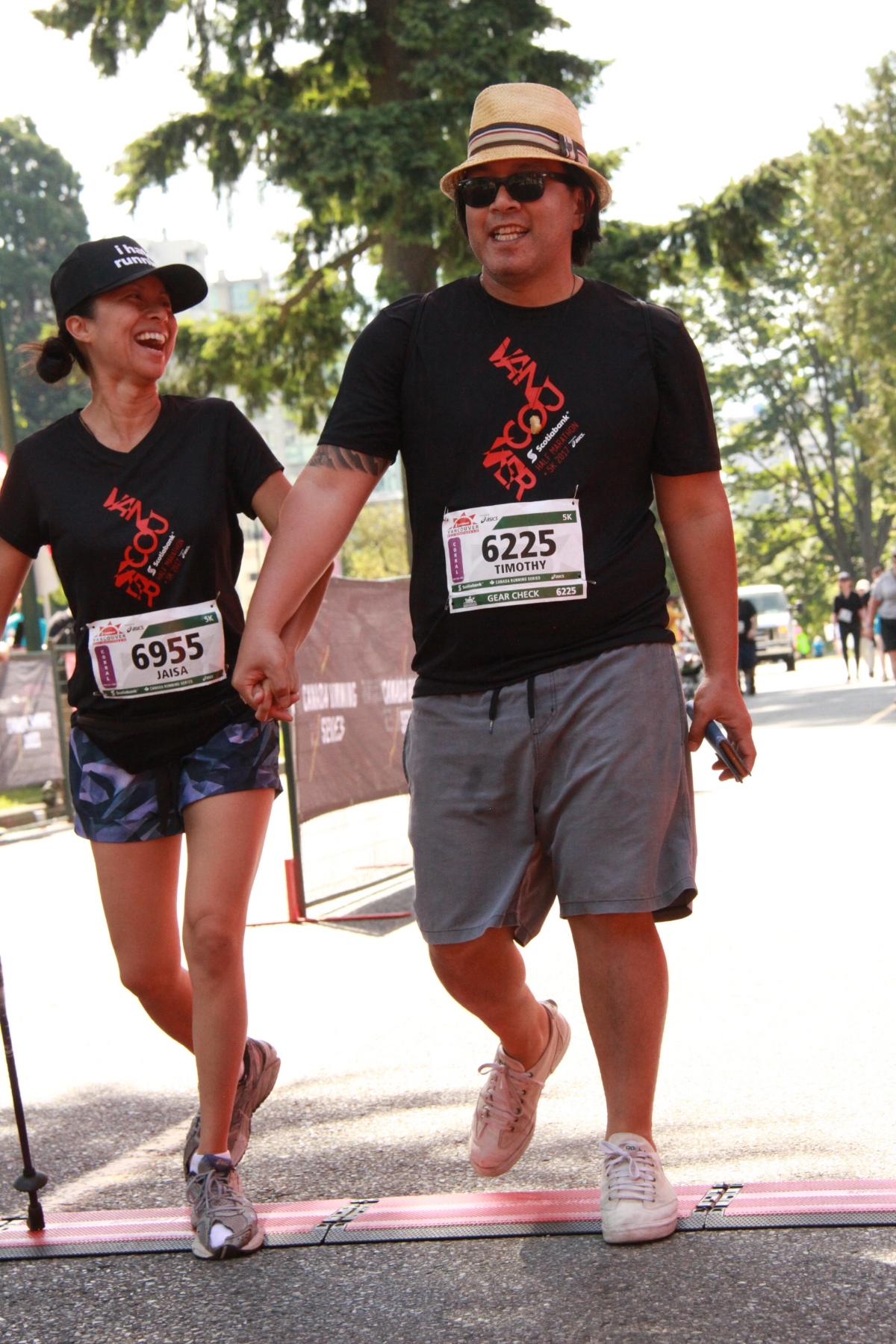 Crossing the finish line of the 2017 Scotiabank 5k with my partner TJ and the use of only one hiking stick (and a lot of sitting breaks along the way!)