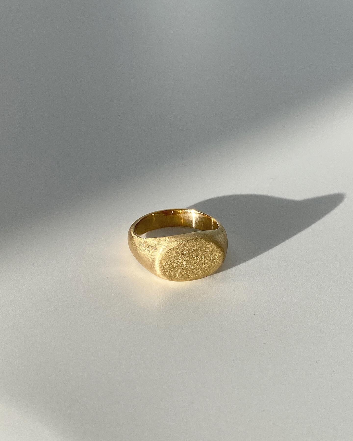 For Theo 🌞✨ Signet Ring Wedding Band &bull; Hand carved, custom in 14k yellow gold &bull; We ended up giving him a high polish finish but pictured here in a matte / brushed look &bull; I love signet rings and this one is a favorite &bull; My clients