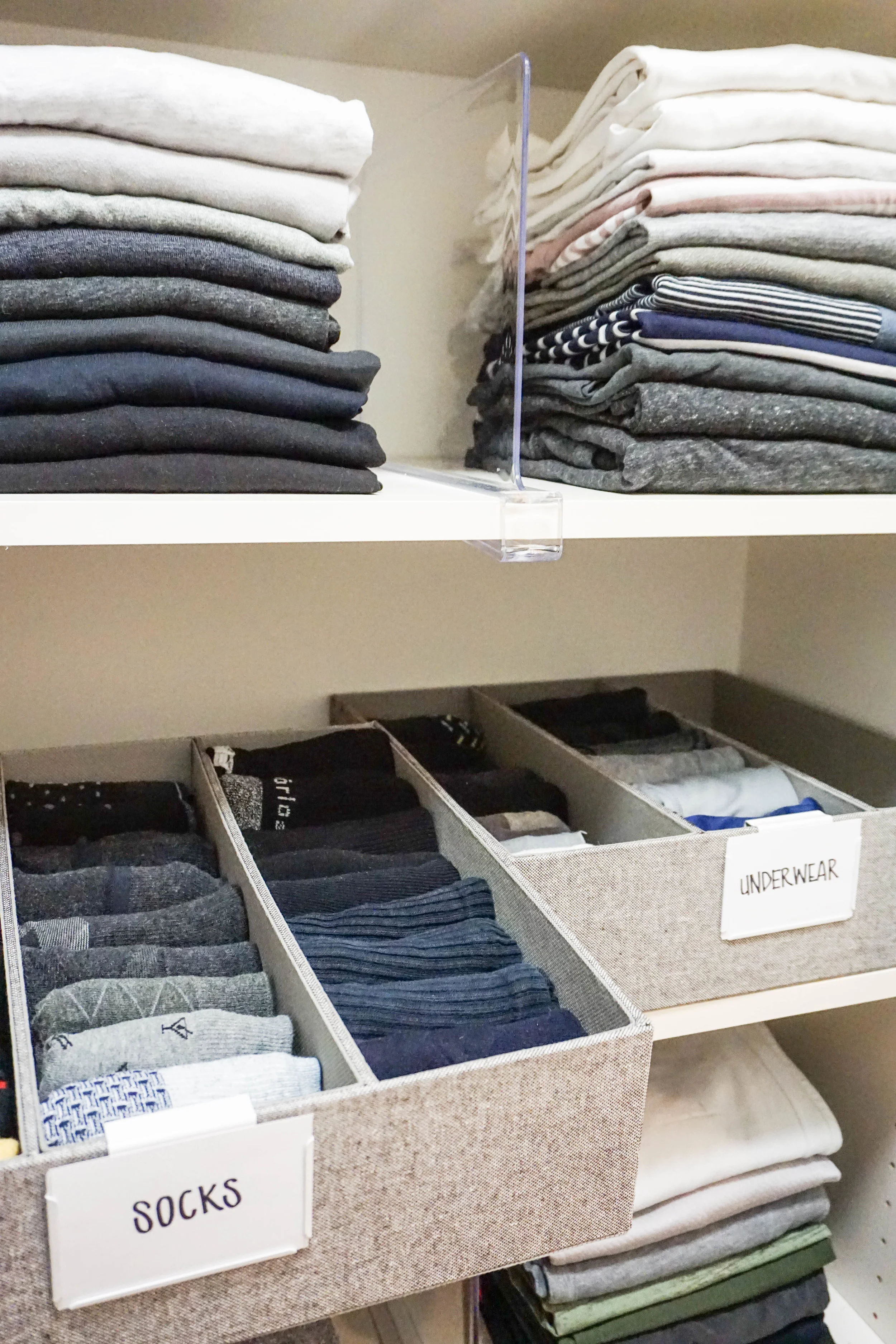 Working with the existing built-ins the client was without drawers for socks and underwear. We used these bins from the Container Store to store their undergarments. Because this is something that will be used daily we put them in an easily accessible spot. The items that are used less often were reserved for the highest and lowest shelves.