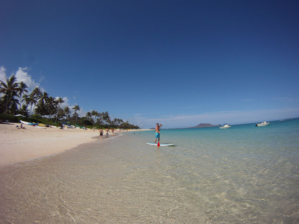 stand up paddler launching from Kailua Beach (Copy)