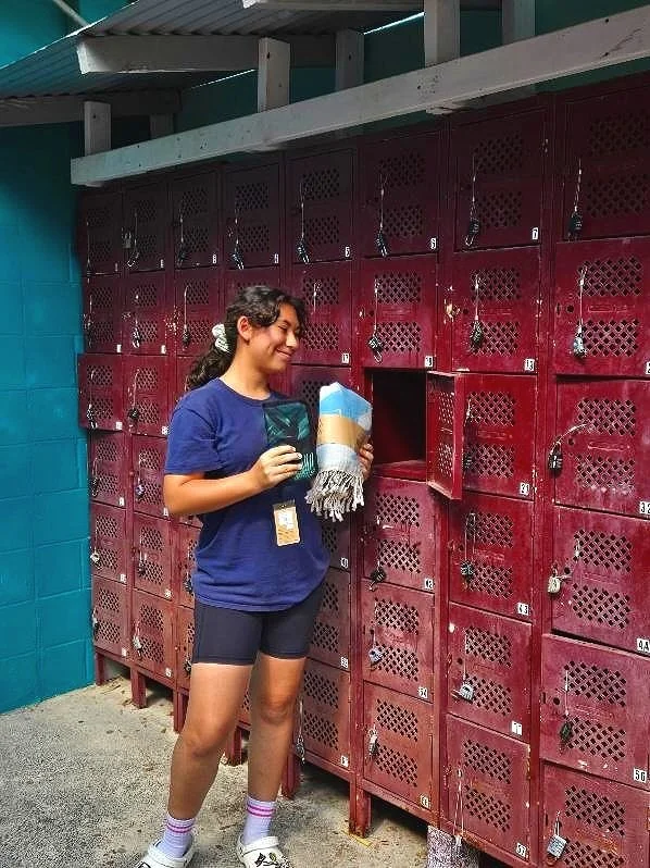 A girl with renting a locker from Kailua beach adventures in Kailua