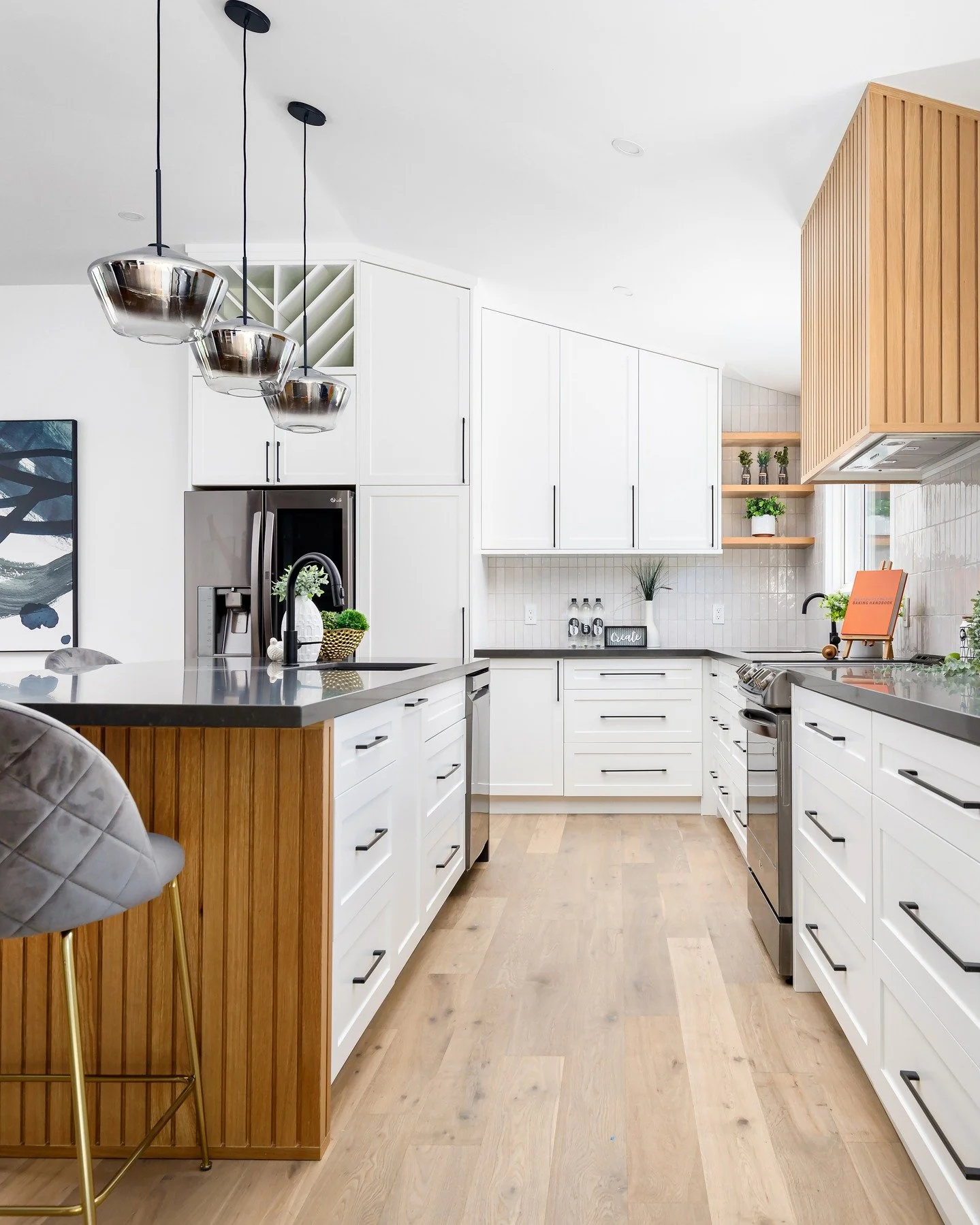 POV: You designed your dream kitchen 😍🖤

Welcome to Project Waterbend&mdash;where thoughtful design meets everyday function. With natural wood textures, striking black finishes, and plenty of room to gather, this space was made for real living (and