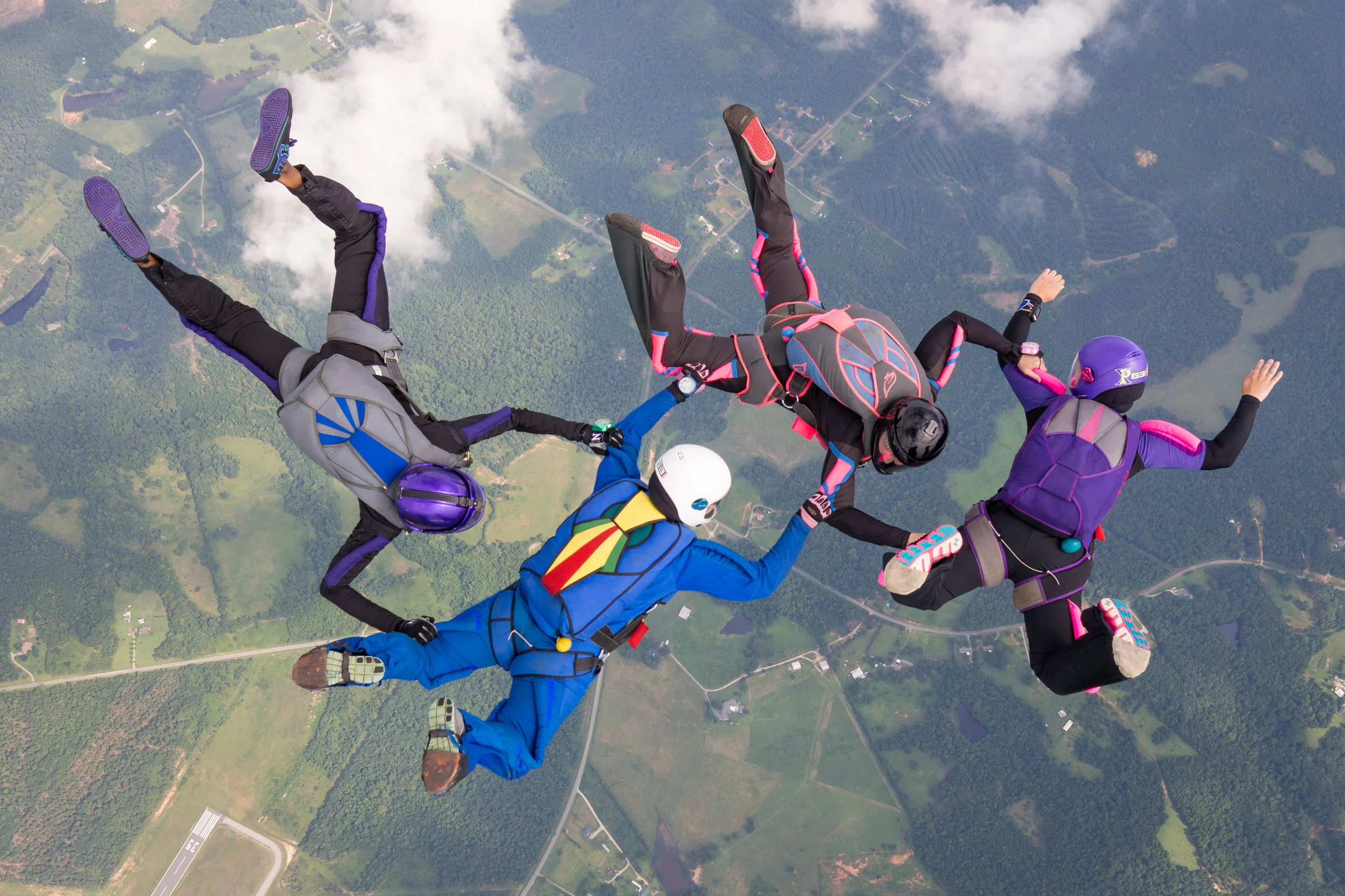 Competing in rookie 4-way relative work at a Carolina Skydiving League meet in 2013 over Skydive Carolina . Photo credit: Chad Wilcox