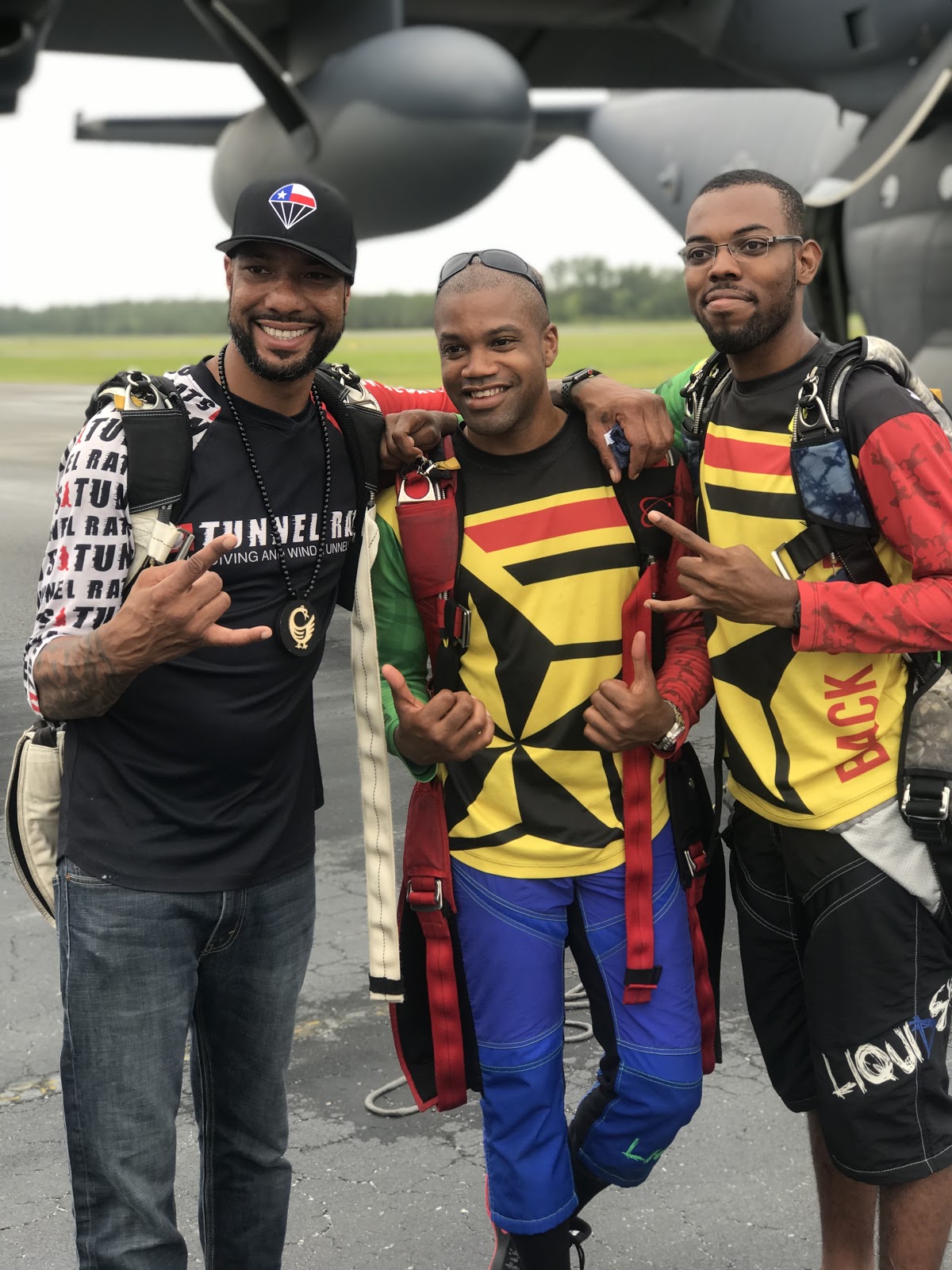  Skydivers  Waz Choudhry ,  Nicholas Walker  and  Will Middlebrooks  flash shaka signs at the camera during the Legacy Flight Academy  Eyes Above the Horizon  flight camp in Valdosta, GA.  Photo courtesy of Danielle Williams.  