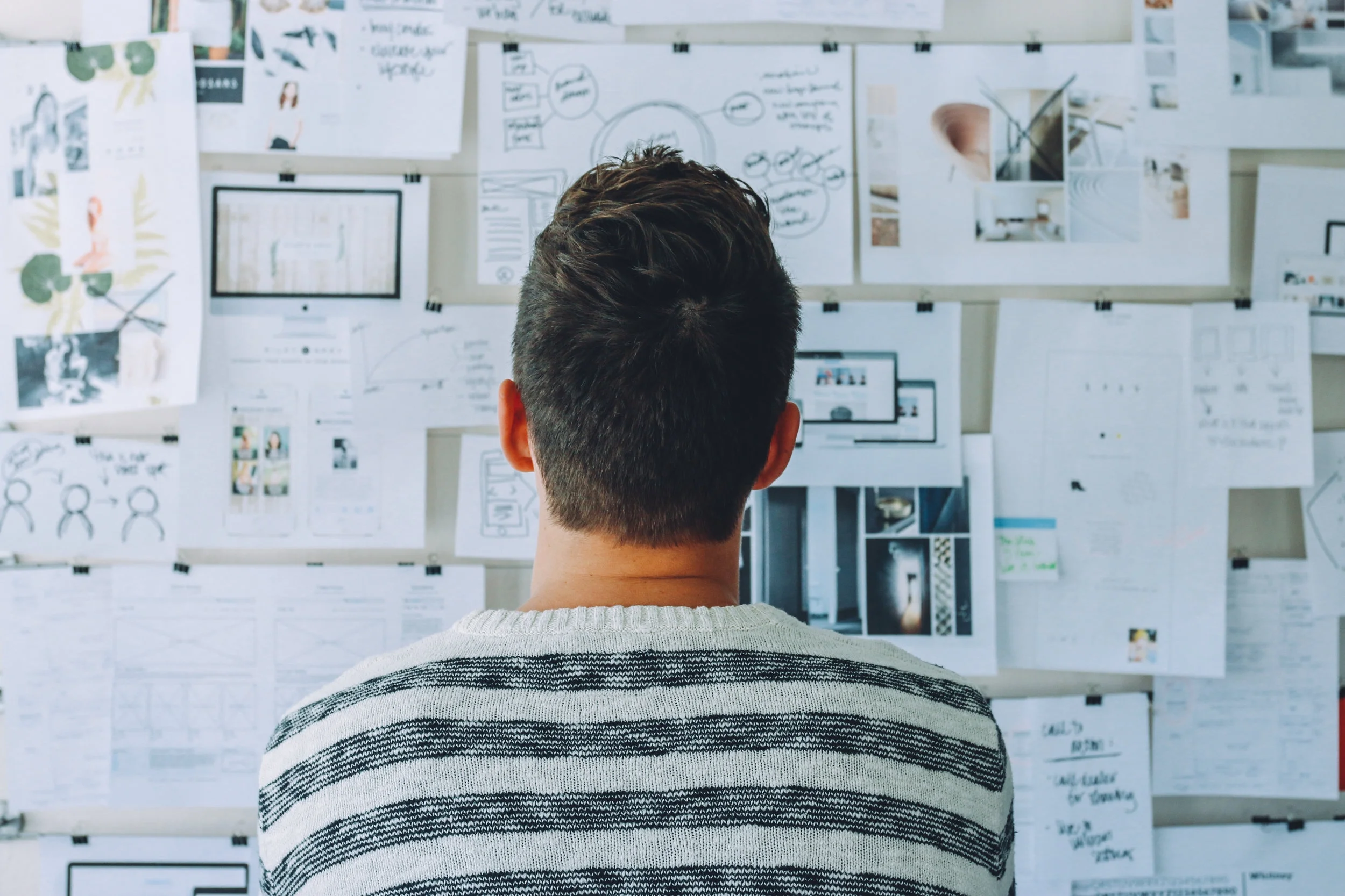 man-looking-at-task-board.jpg