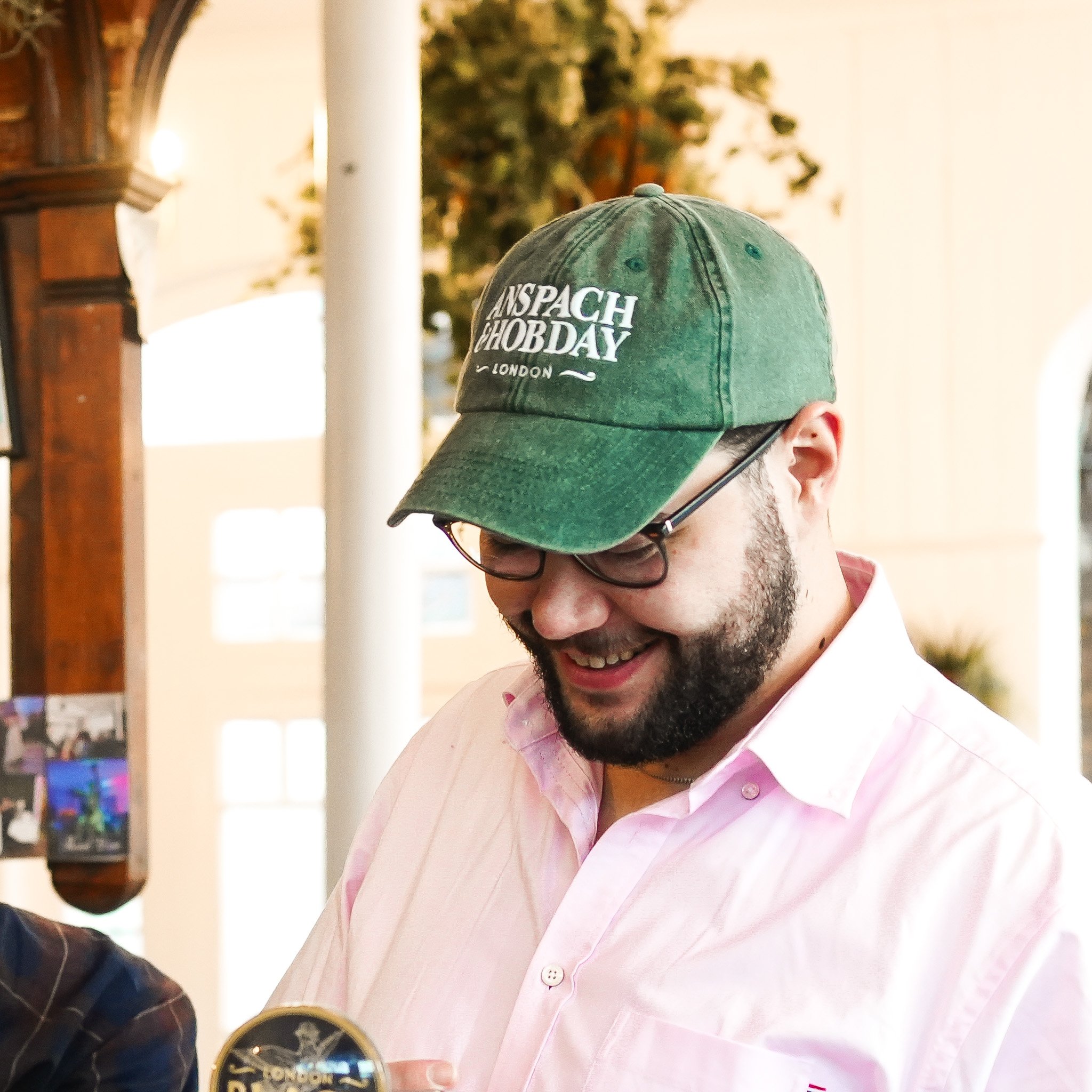 Green Cap Caspar Merch Photo 250131.jpg